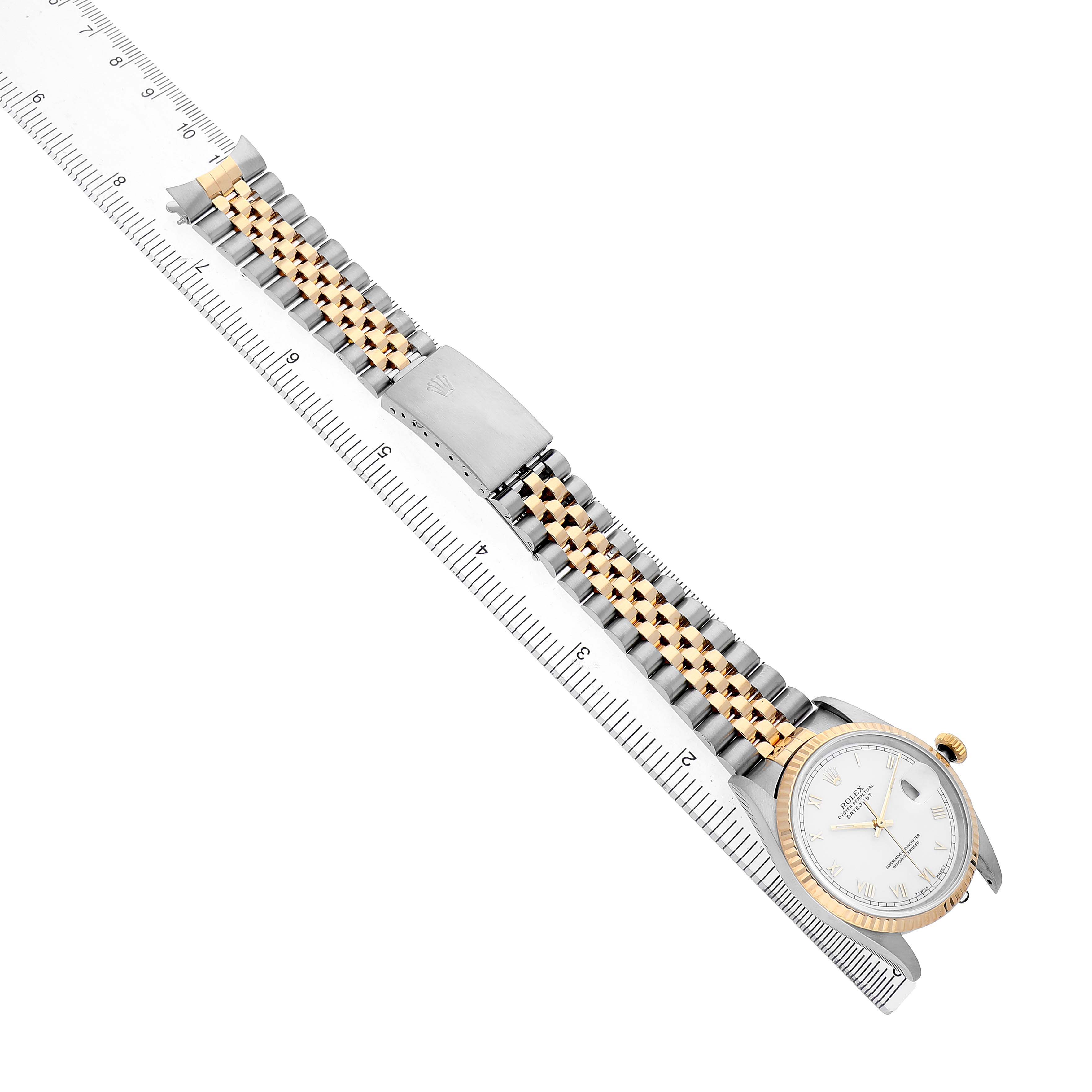 The Rolex Datejust 16233 Men's Steel and Gold (two tone) White Dial watch is shown from an angled overhead view, displaying the bracelet, clasp, and part of the face.