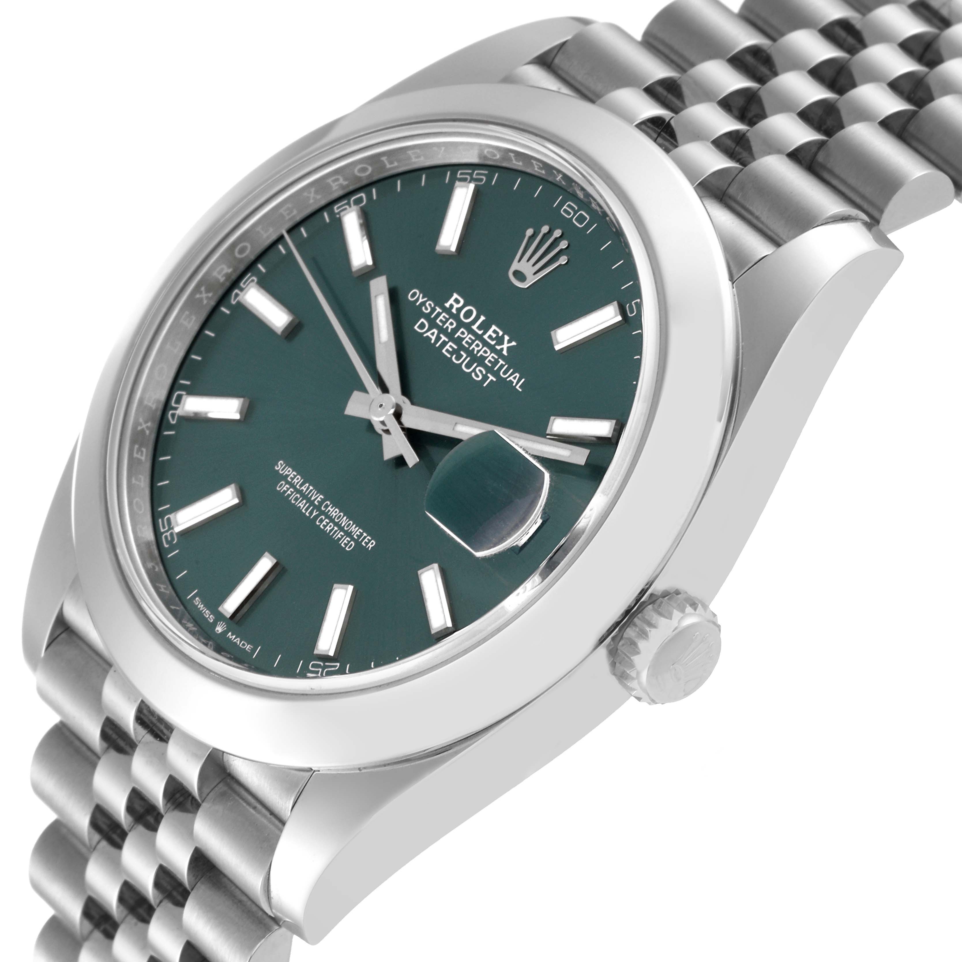 The image shows a side angle of a Rolex Datejust 41 126300 Men
s Stainless Steel Green Dial 126300 Men
s Stainless Steel Green Dial, highlighting the face, bezel, crown, and part of the bracelet.