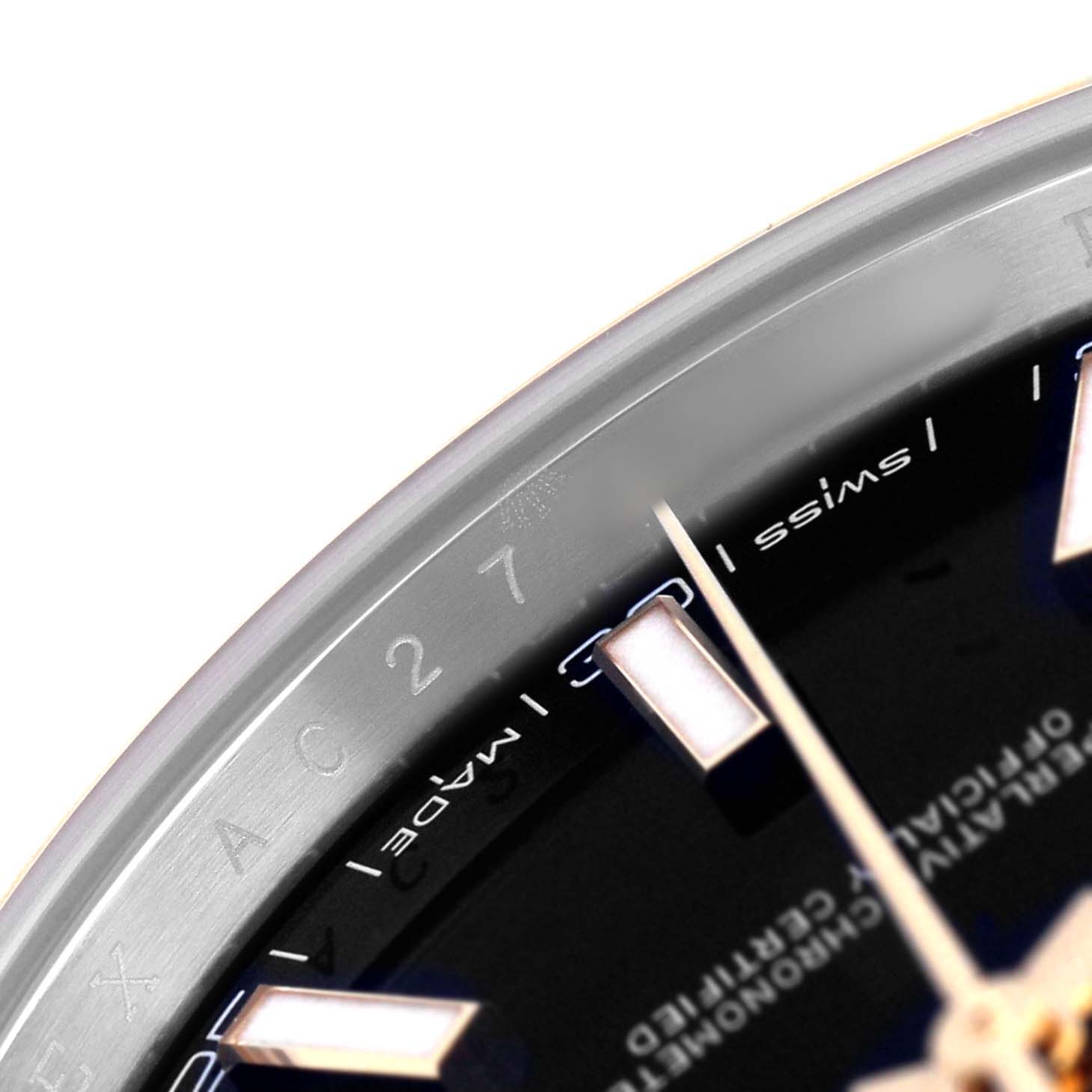 The image shows a close-up of the dial and seconds markers on the Rolex Datejust 41 126303 Men's Steel and Gold (two tone) Black Dial, highlighting the "Swiss Made" text.