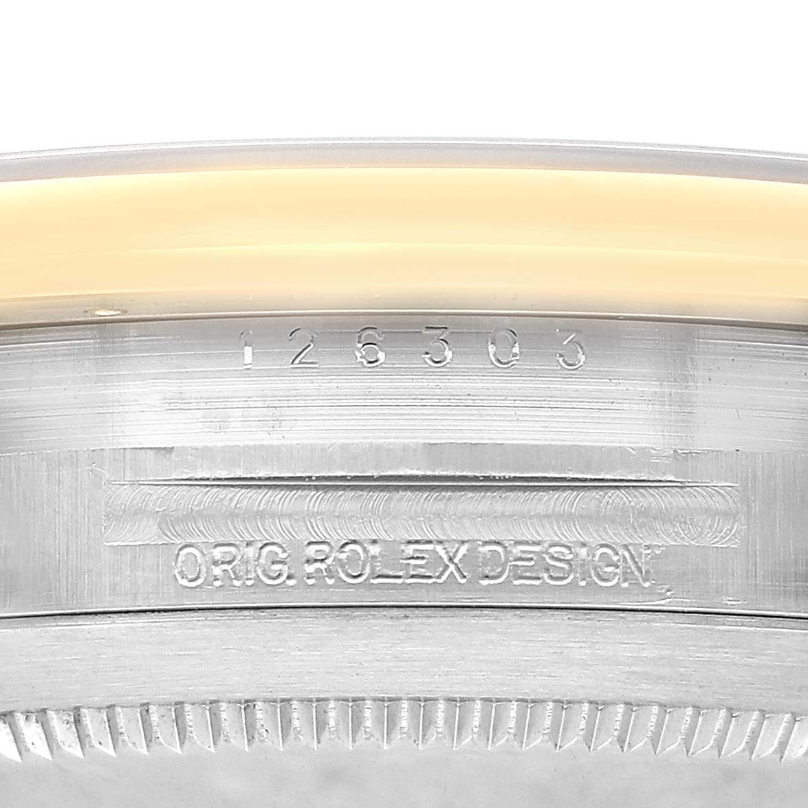 The image shows the engraved side of a Rolex Datejust 41 126303 Men's Steel and Gold (two tone) Black Dial, highlighting the original design and reference number.