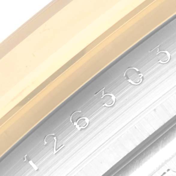 This image shows a close-up of the bezel and minute markings on a Rolex Datejust 41 126303 Men's Steel and Gold (two tone) Grey Dial 126303 Men's Steel and Gold (two tone) Grey Dial watch.