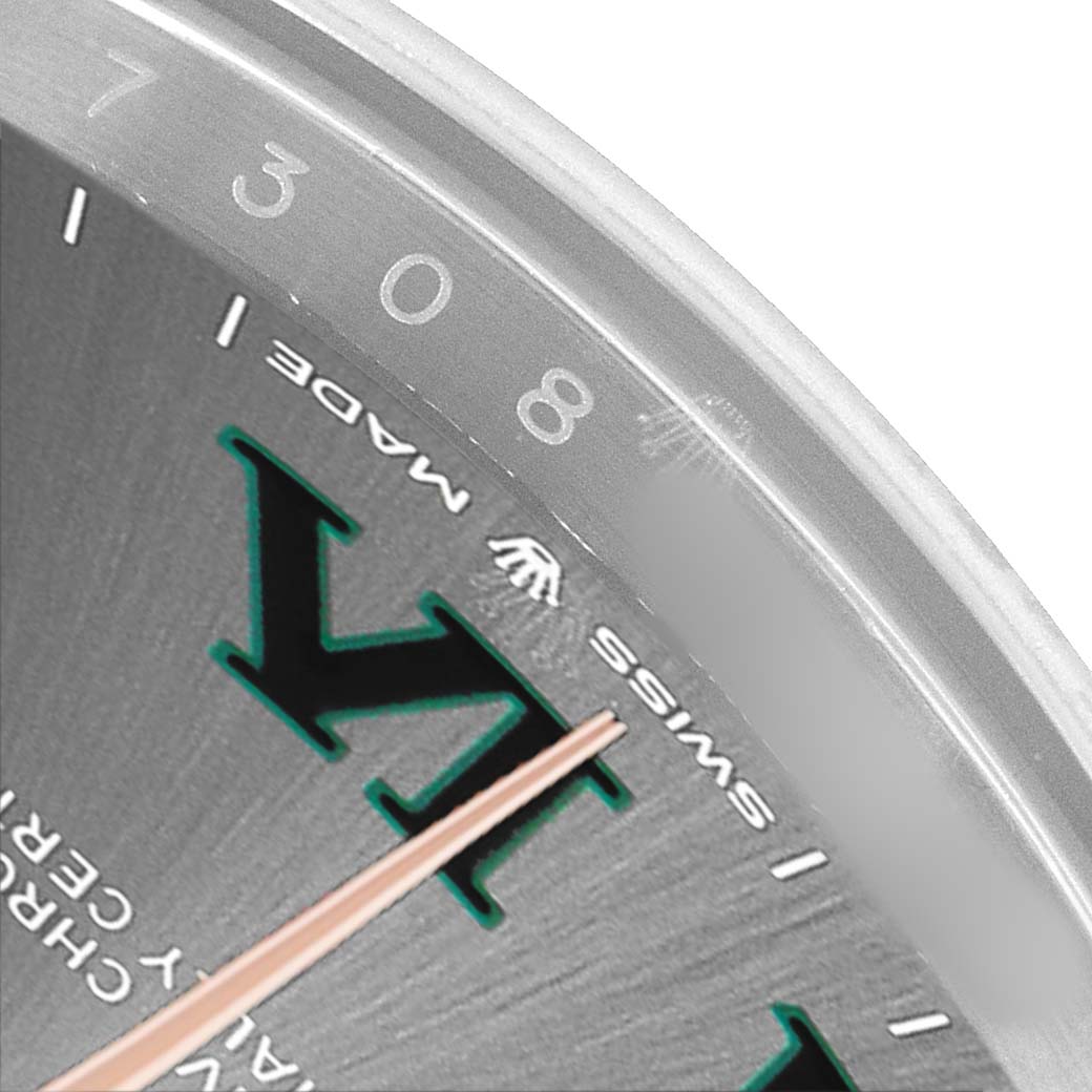 The image shows a close-up of the Rolex Datejust 41 126301 Men's Steel and Gold (two tone) Grey Dial dial, highlighting the Roman numeral, part of the minute track, and “SWISS MADE.”