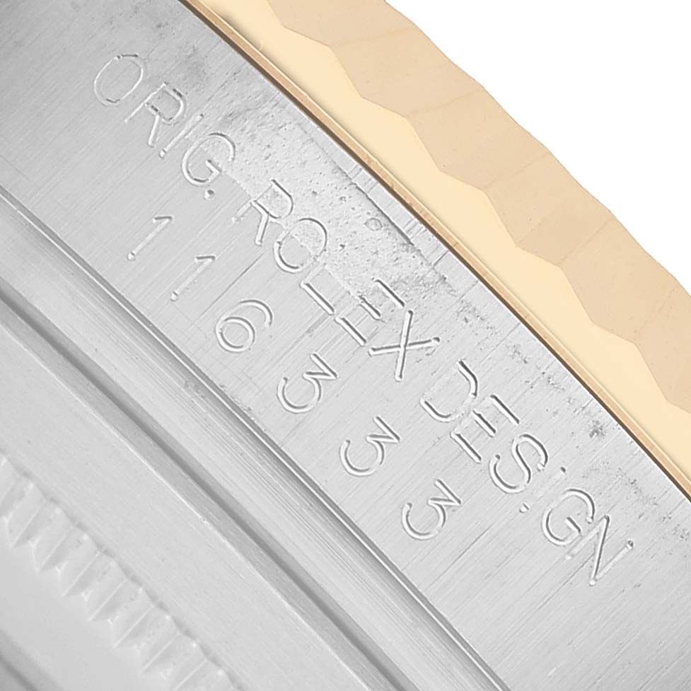 The image shows a close-up of the side engraving on the bezel of a Rolex Datejust 41 116333 Men's Steel and Gold (two tone) Black Dial watch, highlighting the fluted design and model number.