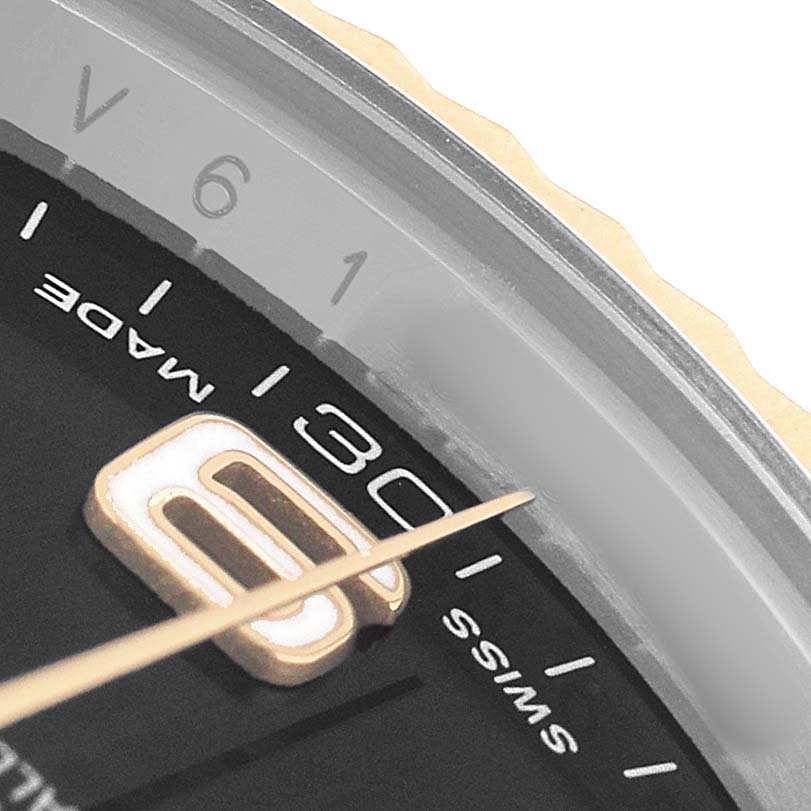 This Rolex Datejust 41 116333 Men's Steel and Gold (two tone) Black Dial image shows a close-up of the dial, focusing on the date window and second hand.