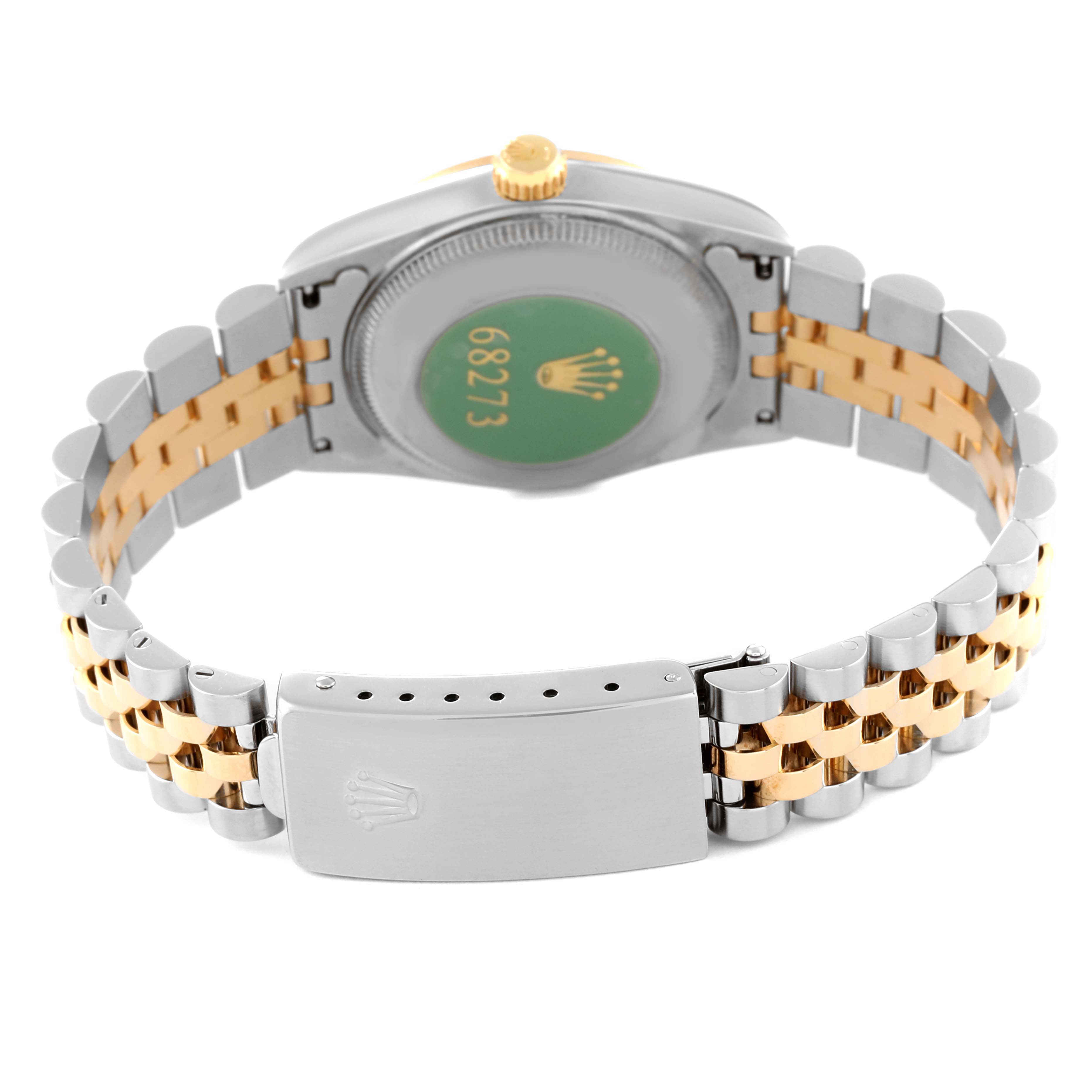 This image shows the back view of a Mid-Size Rolex watch, focusing on the case back and the two-tone bracelet and clasp.