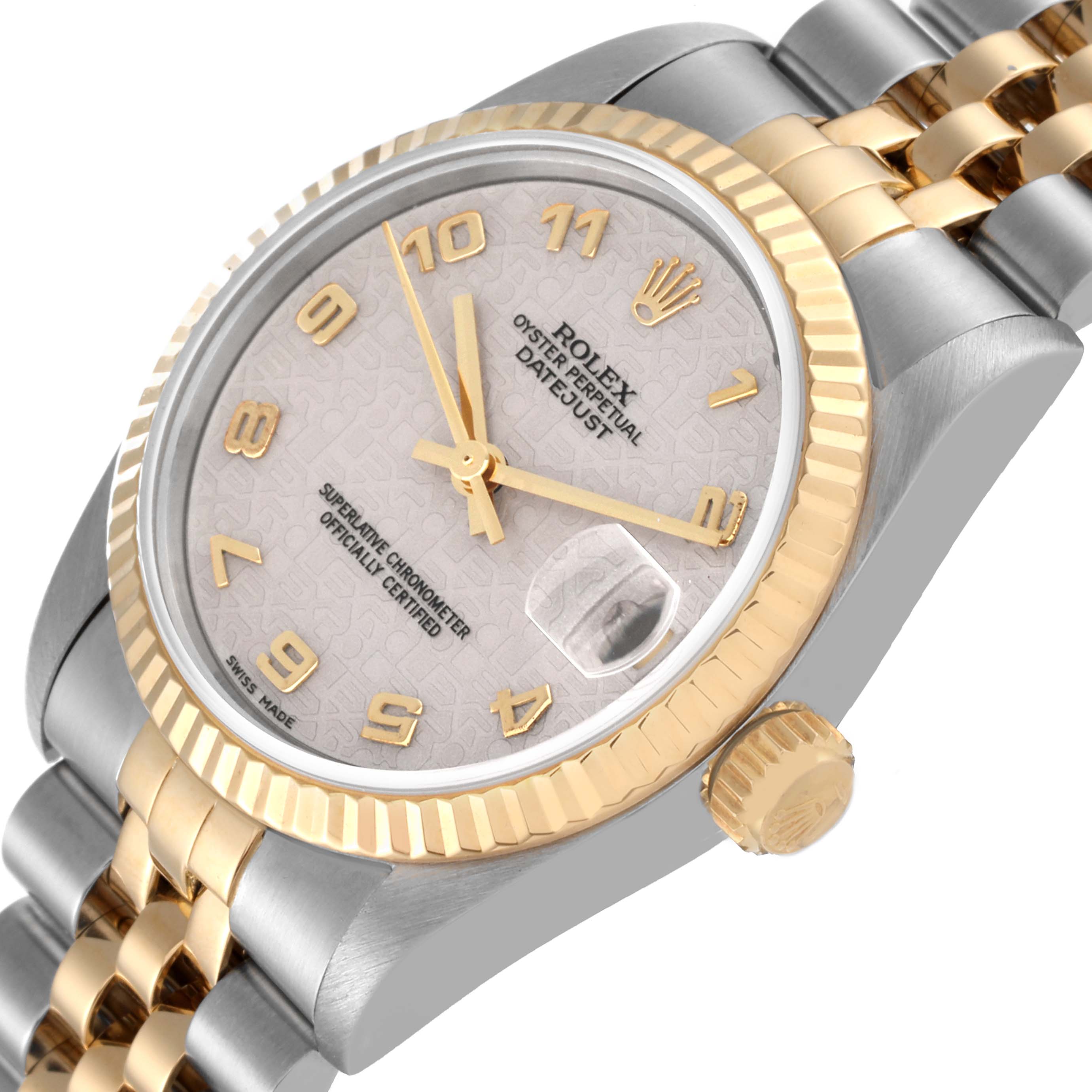 This image shows a Rolex Mid-Size 68273 Women
s Steel and Gold (two tone) White Dial 68273 Women
s Steel and Gold (two tone) White Dial watch from an angled top view, highlighting the dial, bezel, crown, and bracelet.