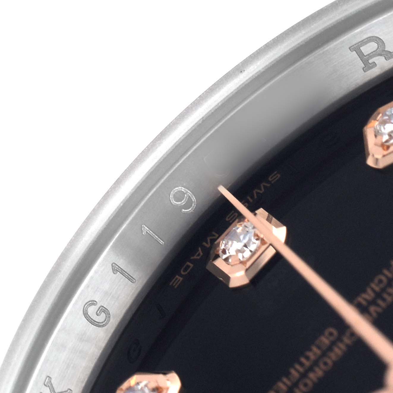 The image shows a close-up of the Rolex Datejust 116231 Men's Steel and Gold (two tone) Black Dial watch's bezel and diamond markers on the dial.