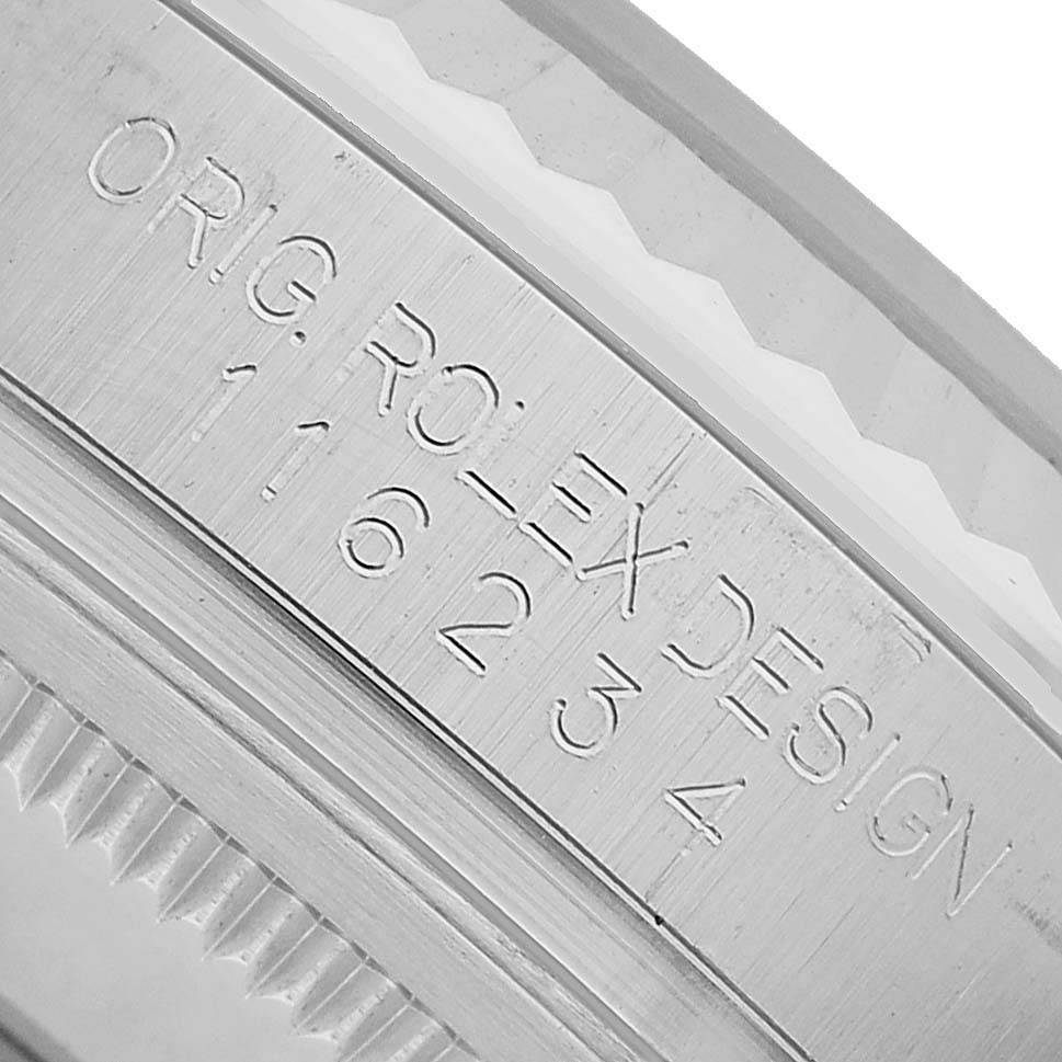 The image shows a close-up of the Rolex Datejust 116234 Men's Stainless Steel White Dial's case side, highlighting the model number engraving.