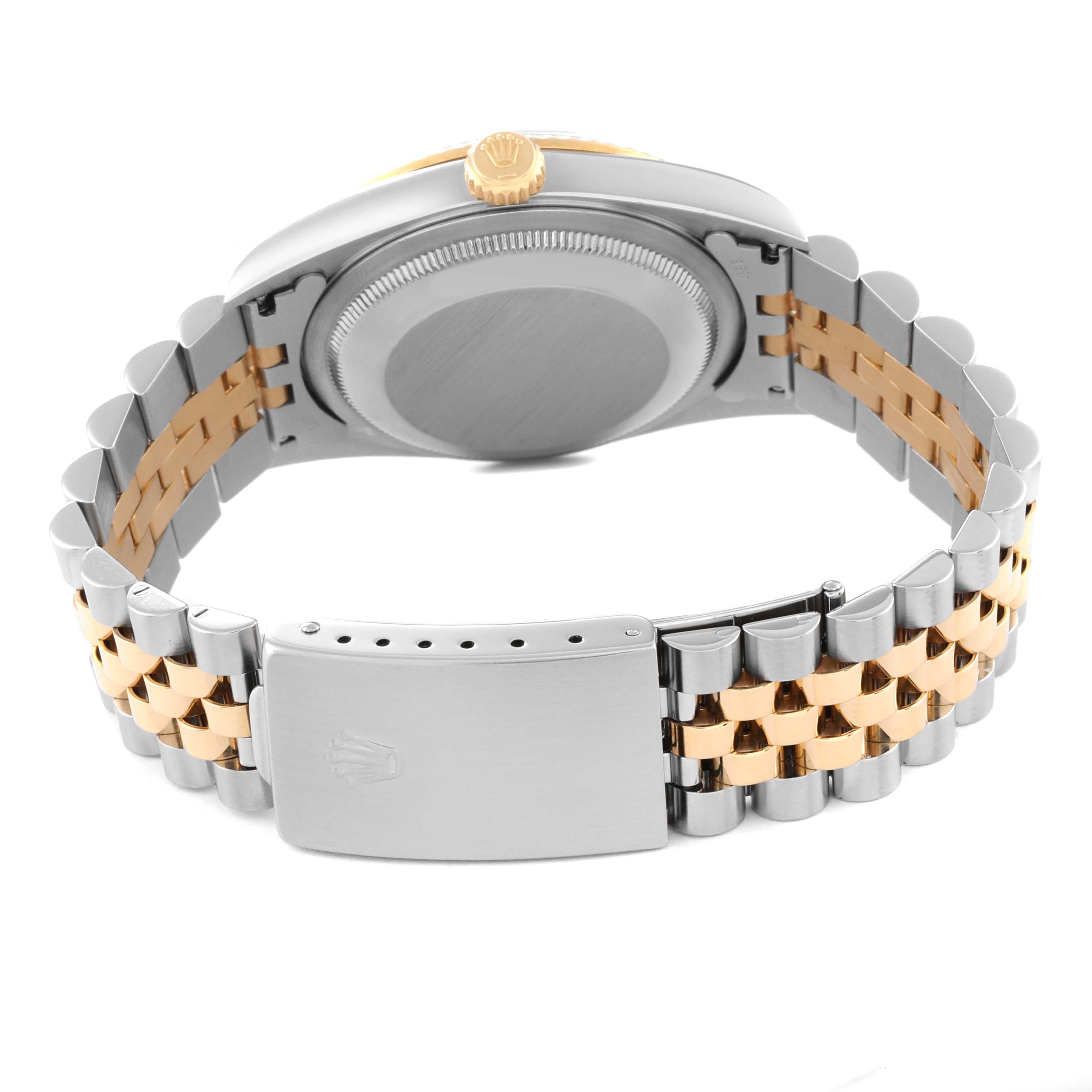 The image shows the back and bracelet of a Rolex Datejust 16233 Men's Steel and Gold (two tone) Black Dial 16233 Men's Steel and Gold (two tone) Black Dial watch, highlighting the two-tone metal and clasp.