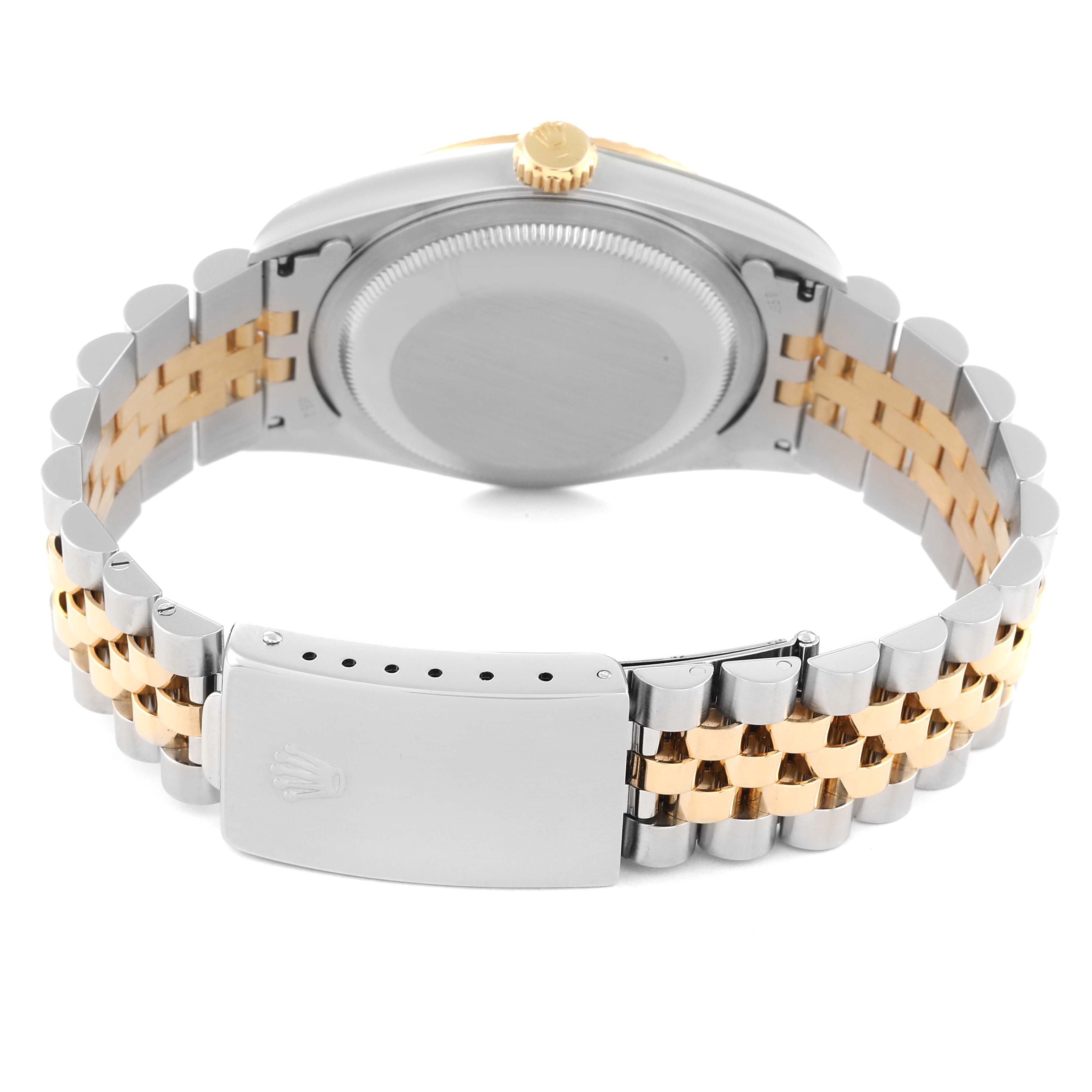 The image shows the back and clasp of a Rolex Datejust 16233 Men's Steel and Gold (two tone) Champagne Dial 16233 Men's Steel and Gold (two tone) Champagne Dial watch, highlighting its two-tone metal bracelet.