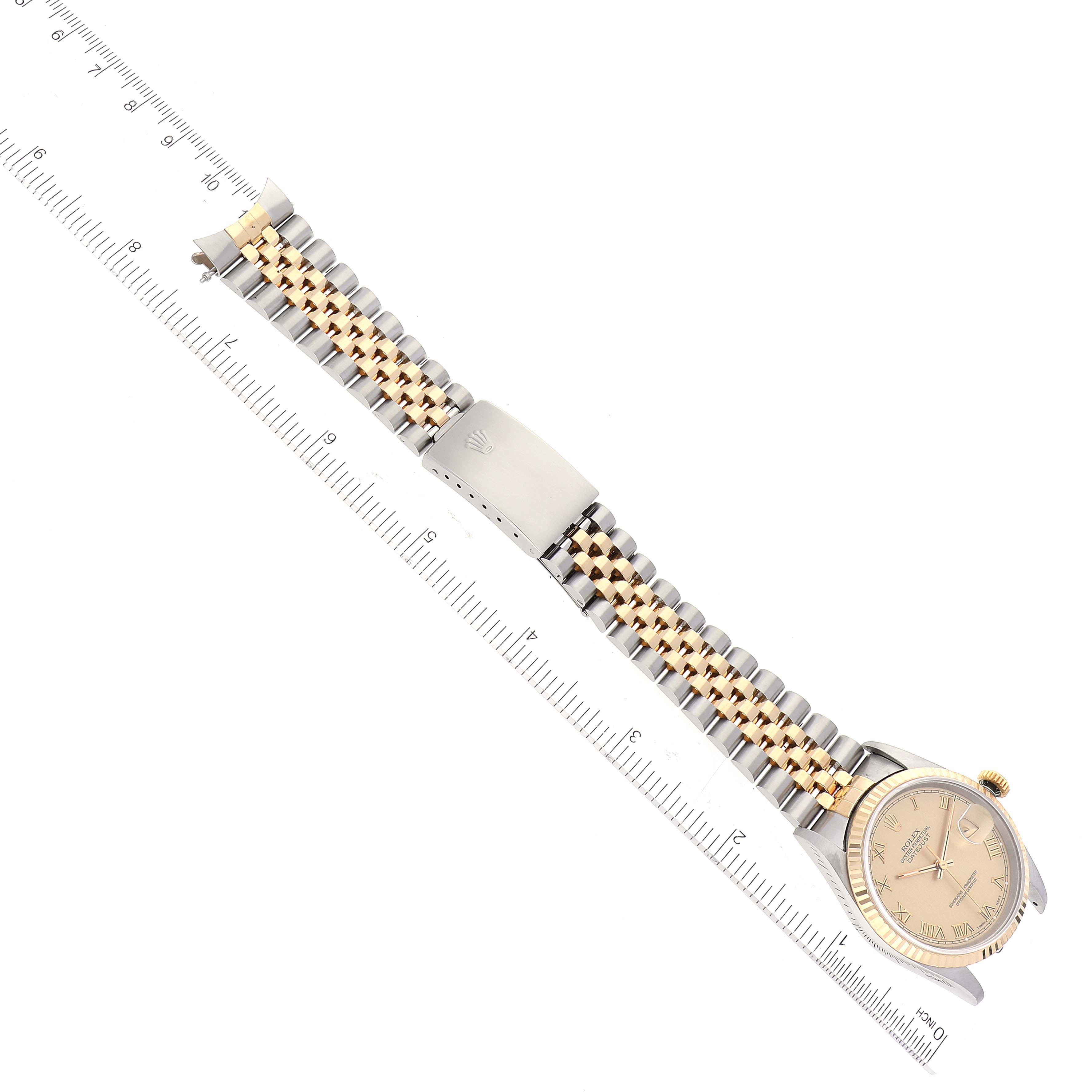 This image shows a top-down view of a Rolex Datejust 16233 Men's Steel and Gold (two tone) Champagne Dial 16233 Men's Steel and Gold (two tone) Champagne Dial watch, highlighting the face, bracelet, and clasp.