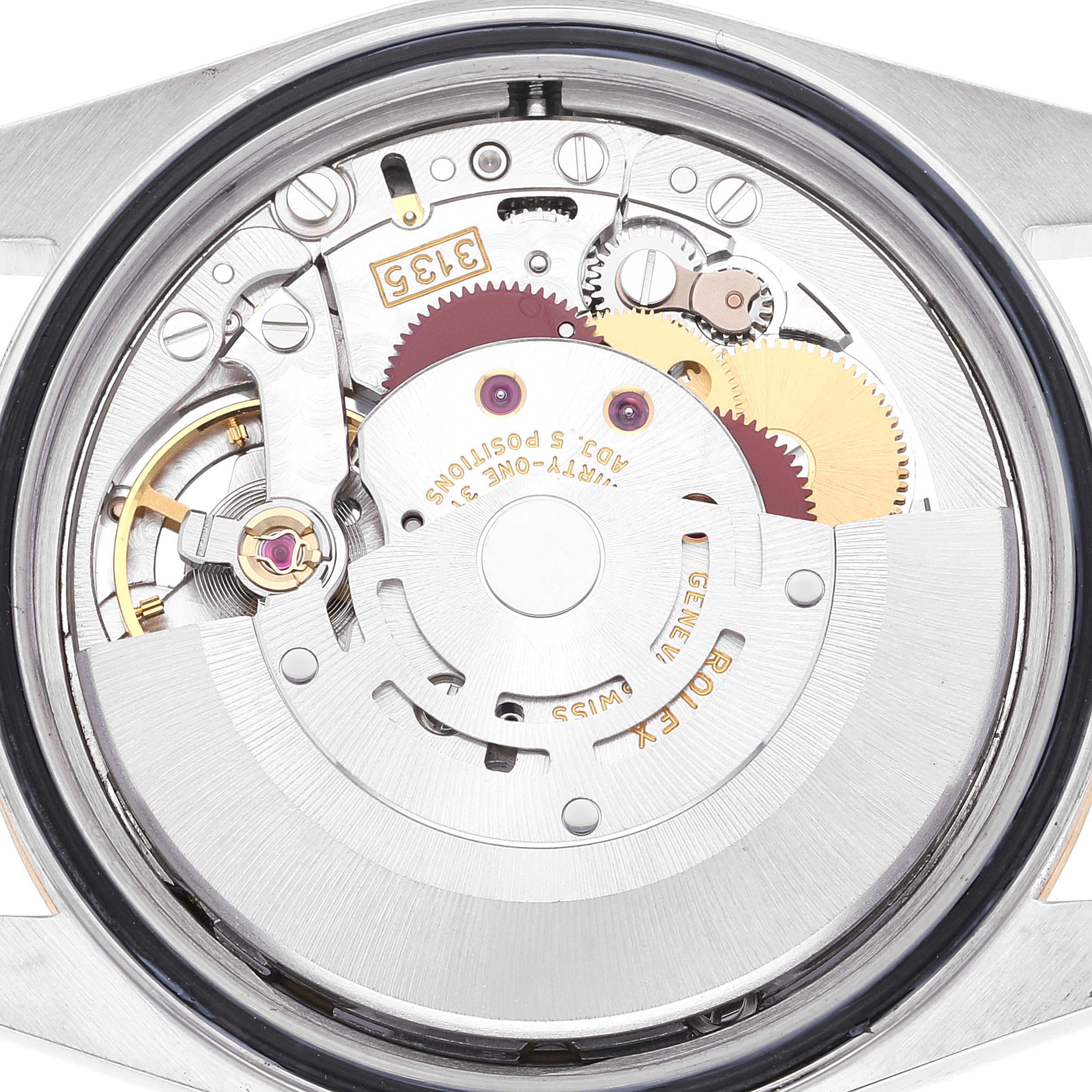 This image shows the internal mechanical movement of a Rolex Datejust 16233 Men's Steel and Gold (two tone) Champagne Dial 16233 Men's Steel and Gold (two tone) Champagne Dial watch from a back angle.