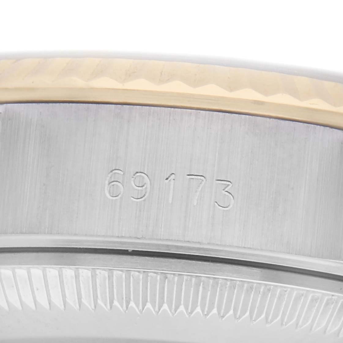 The image shows a close-up of the side of a Rolex Datejust 69173 Women's Steel and Gold (two tone) White Dial 69173 Women's Steel and Gold (two tone) White Dial watch case, displaying the model number "69173."