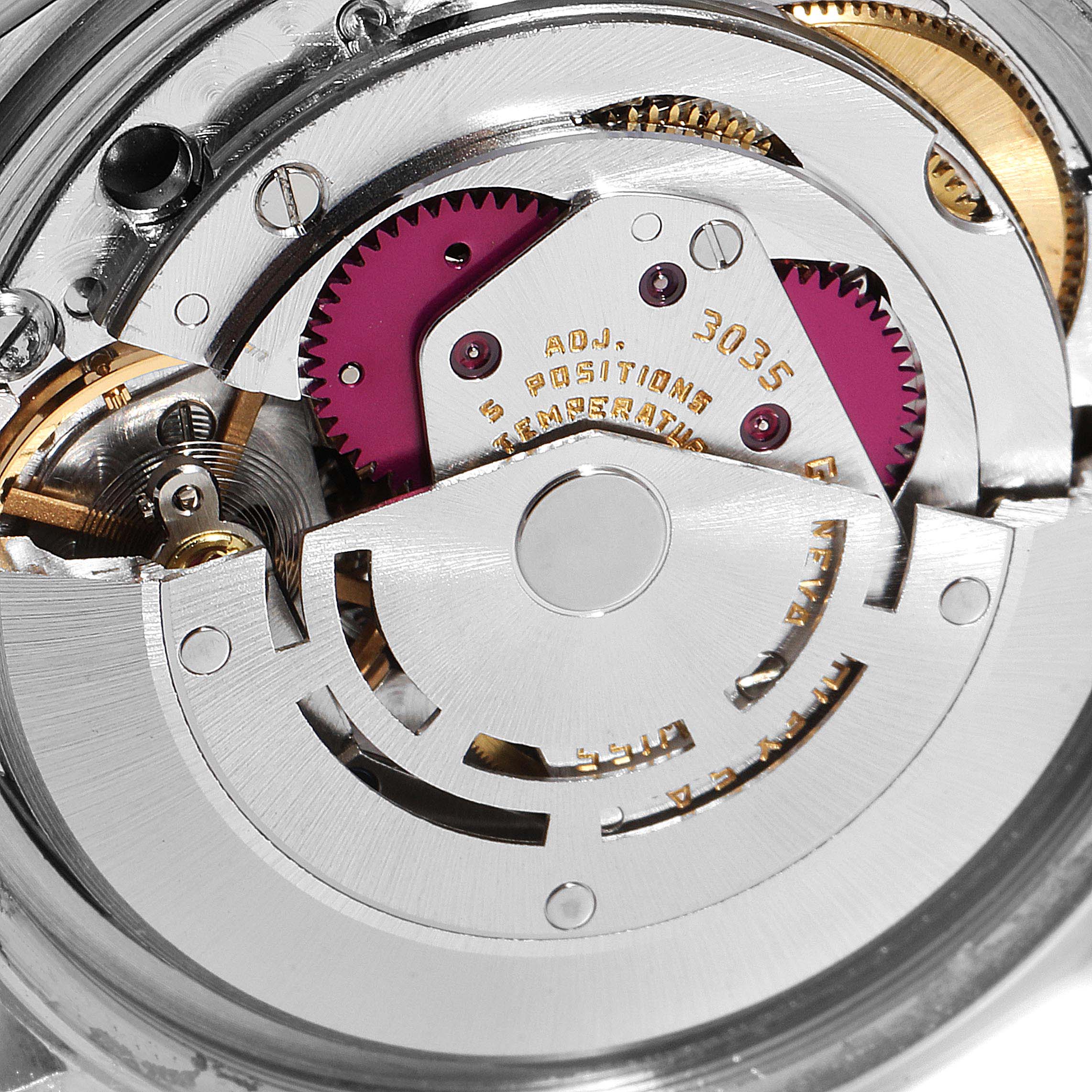 The image shows a close-up view of the movement mechanism of a Rolex Vintage Collection 16014 Men's Stainless Steel Black Dial 16014 Men's Stainless Steel Black Dial model.