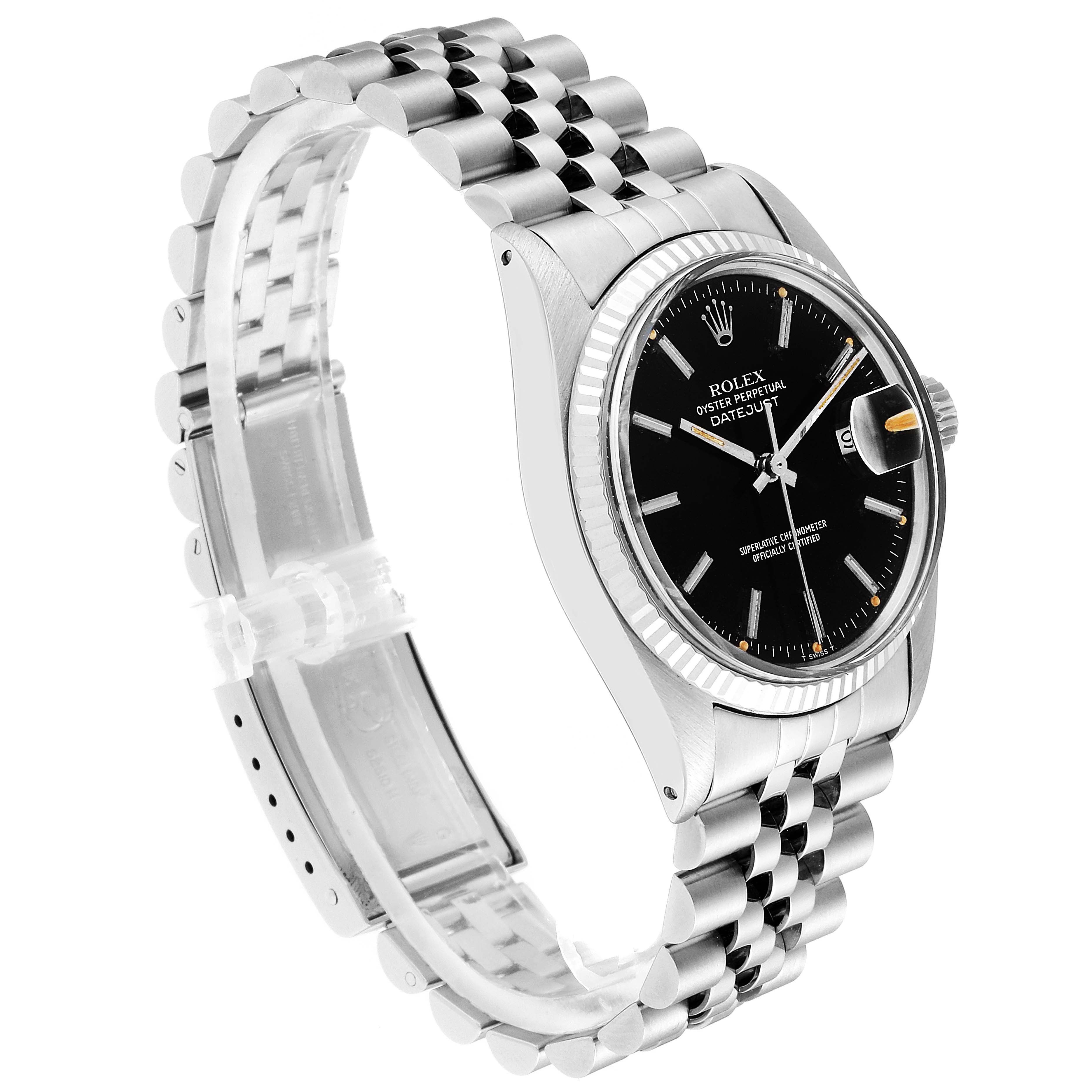 The image shows a side angle of the Rolex Vintage Collection 16014 Men's Stainless Steel Black Dial 16014 Men's Stainless Steel Black Dial watch, highlighting the black dial, fluted bezel, and Jubilee bracelet.