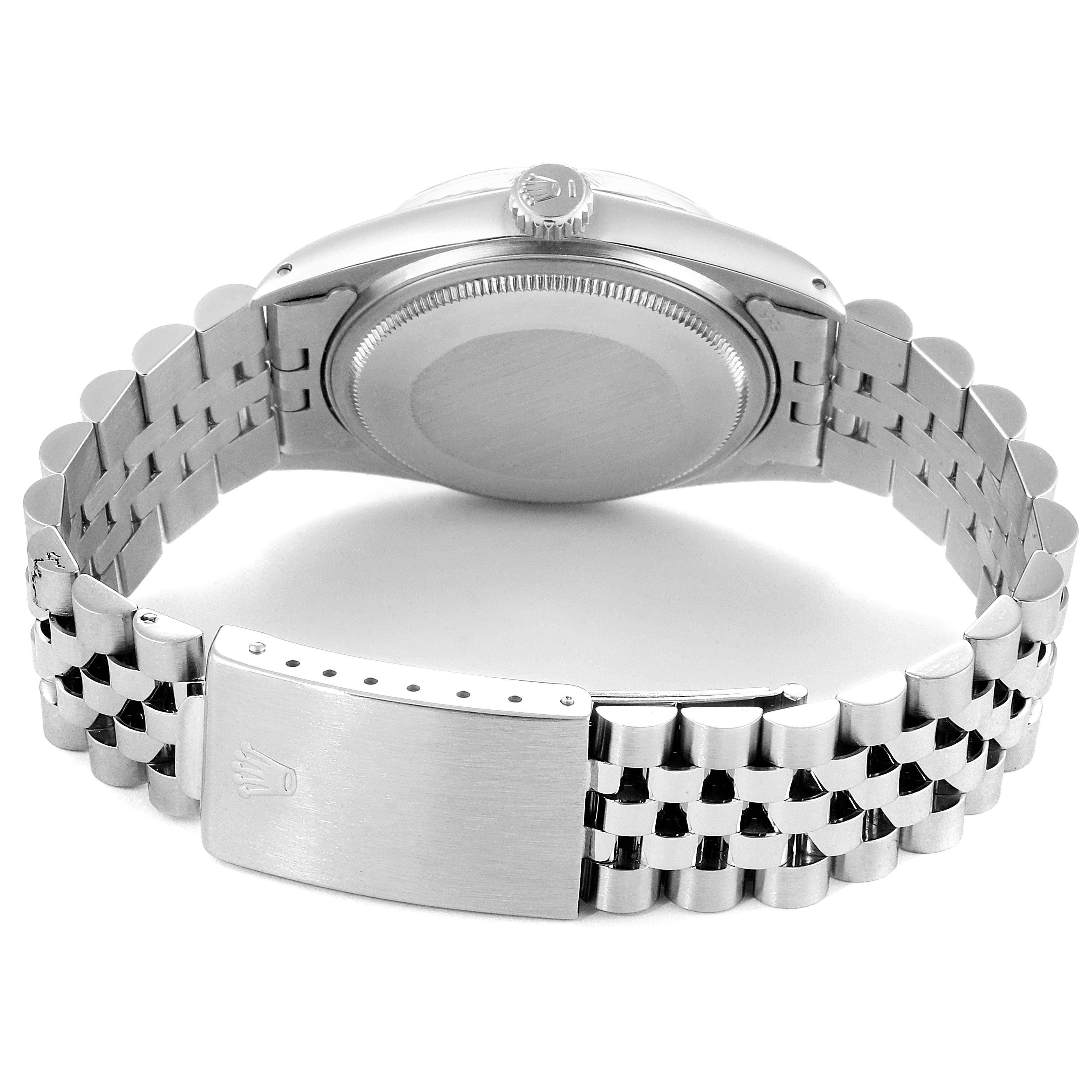 This image shows the back of the Rolex Vintage Collection 16014 Men's Stainless Steel Black Dial 16014 Men's Stainless Steel Black Dial watch, highlighting the case and clasp of the bracelet.