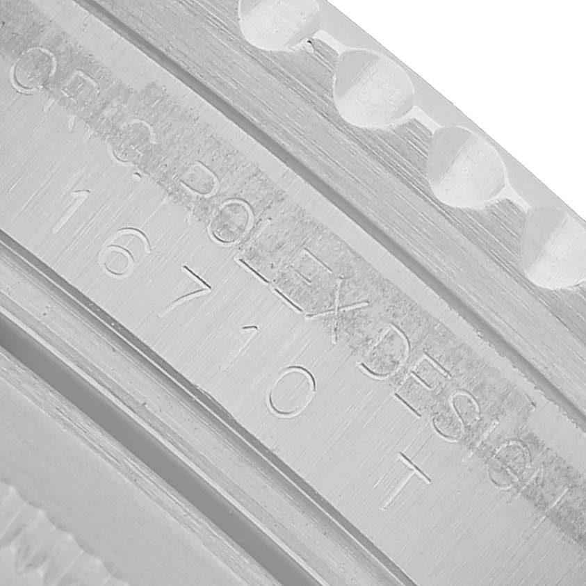 The image shows a close-up of the engraved case side of a Rolex GMT-Master 16710 Men's Stainless Steel Black Dial, emphasizing the model number "16710."