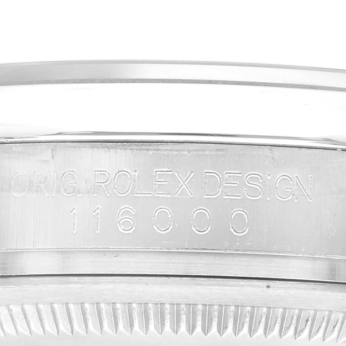 This close-up image of the Rolex Oyster Perpetual 116000 Men's Stainless Steel Black Dial 116000 Men's Stainless Steel Black Dial shows the middle case edge and bezel teeth.