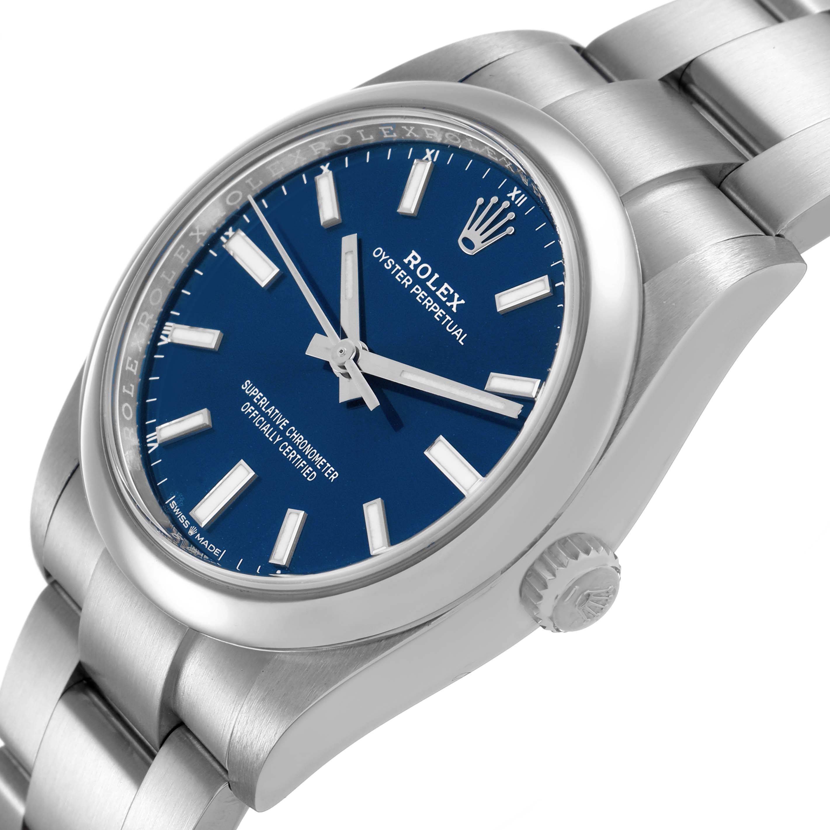 The Rolex Oyster Perpetual M124200-0003 Men's Stainless Steel Blue Dial watch is shown at an angled side view, displaying the blue dial, crown, and bracelet.