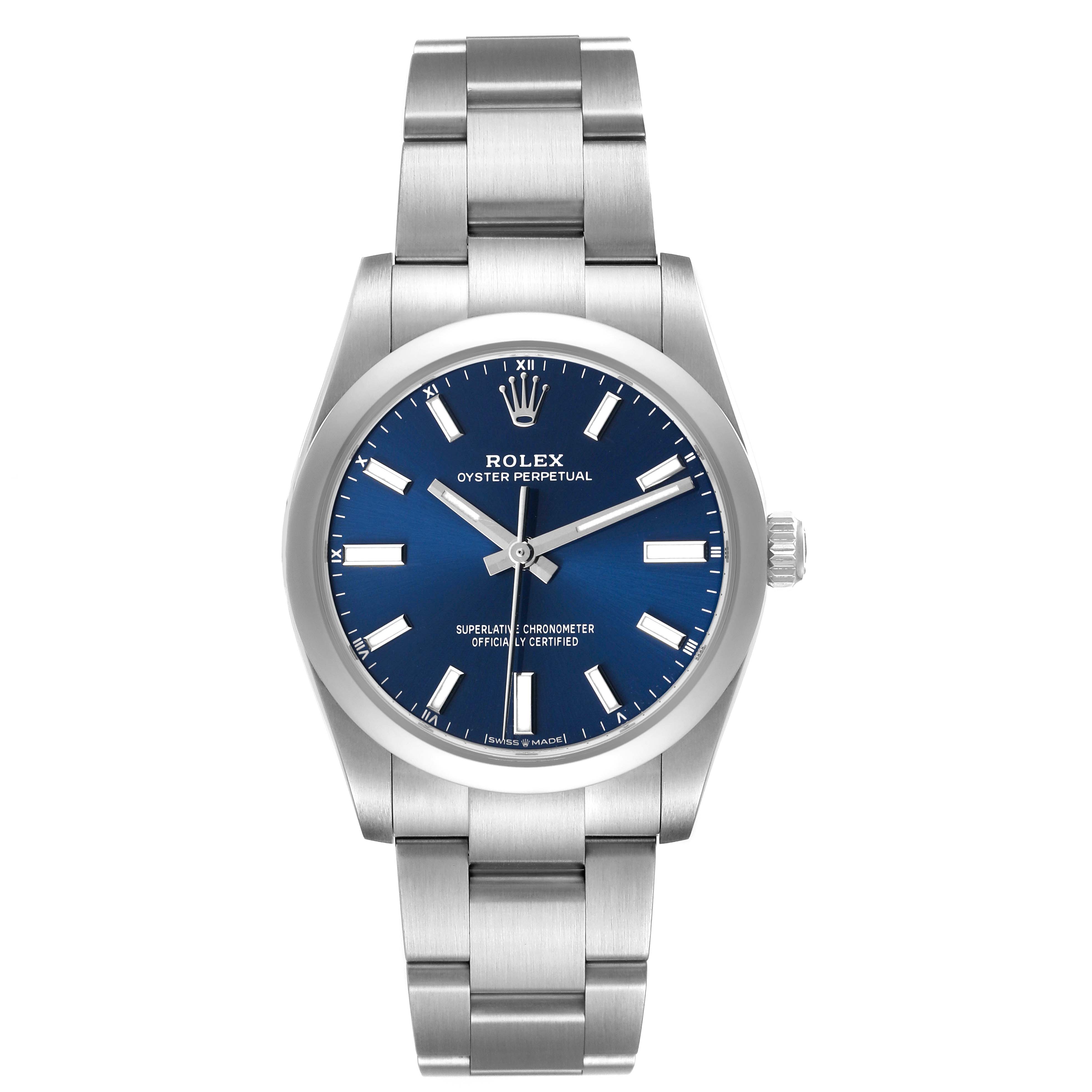 The Rolex Oyster Perpetual M124200-0003 Men's Stainless Steel Blue Dial watch is shown from a top-down angle, displaying its blue dial, bezel, crown, and stainless steel bracelet.