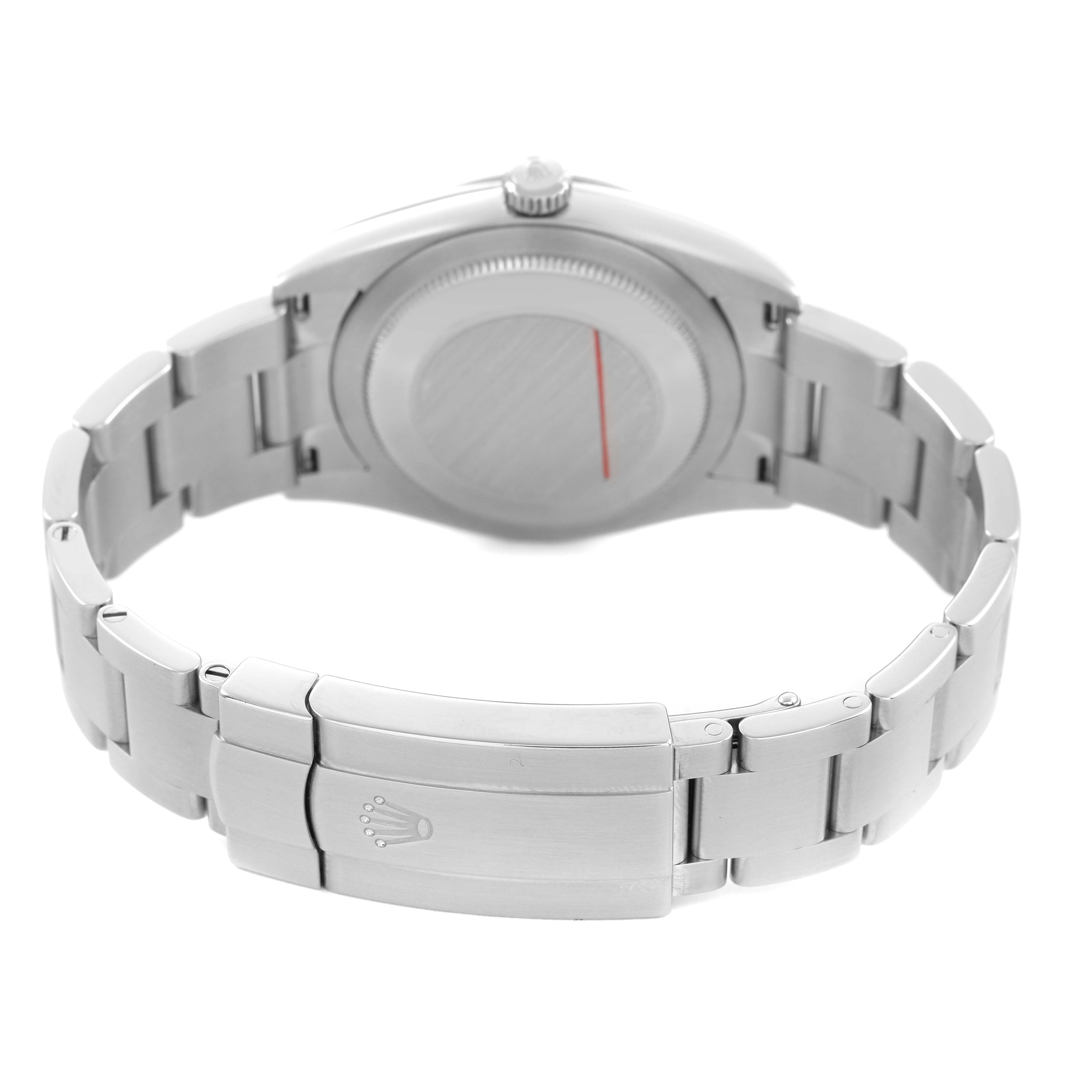 The image shows the back of a Rolex Oyster Perpetual M124200-0003 Men's Stainless Steel Blue Dial, focusing on the case back, bracelet, and clasp.