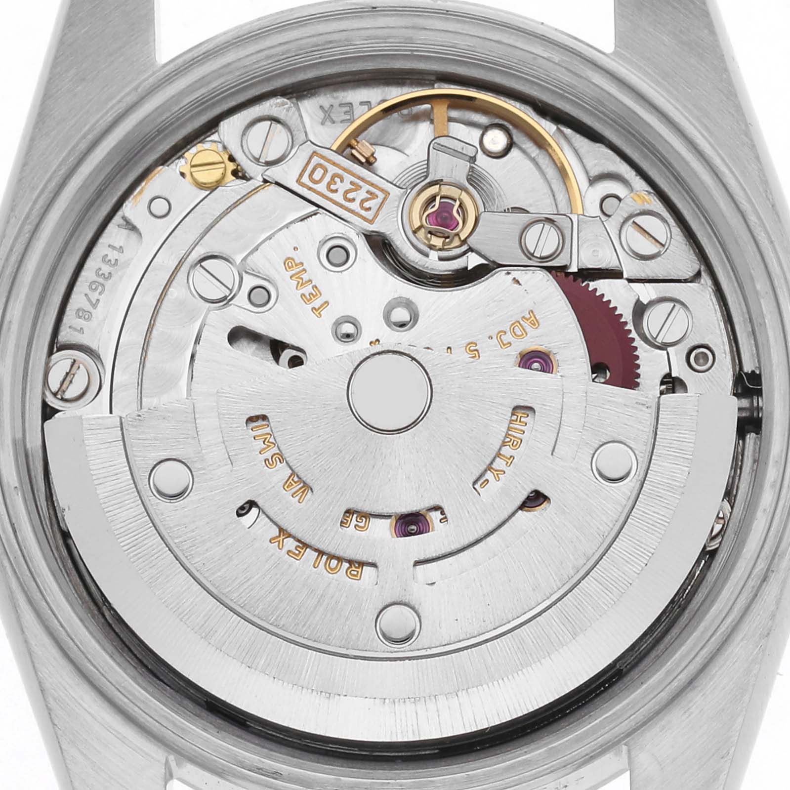 The image shows the Rolex Oyster Perpetual 76080 Women's Stainless Steel Silver Dial 76080 Women's Stainless Steel Silver Dial watch movement from the back, highlighting gears, rotor, and intricate mechanics.