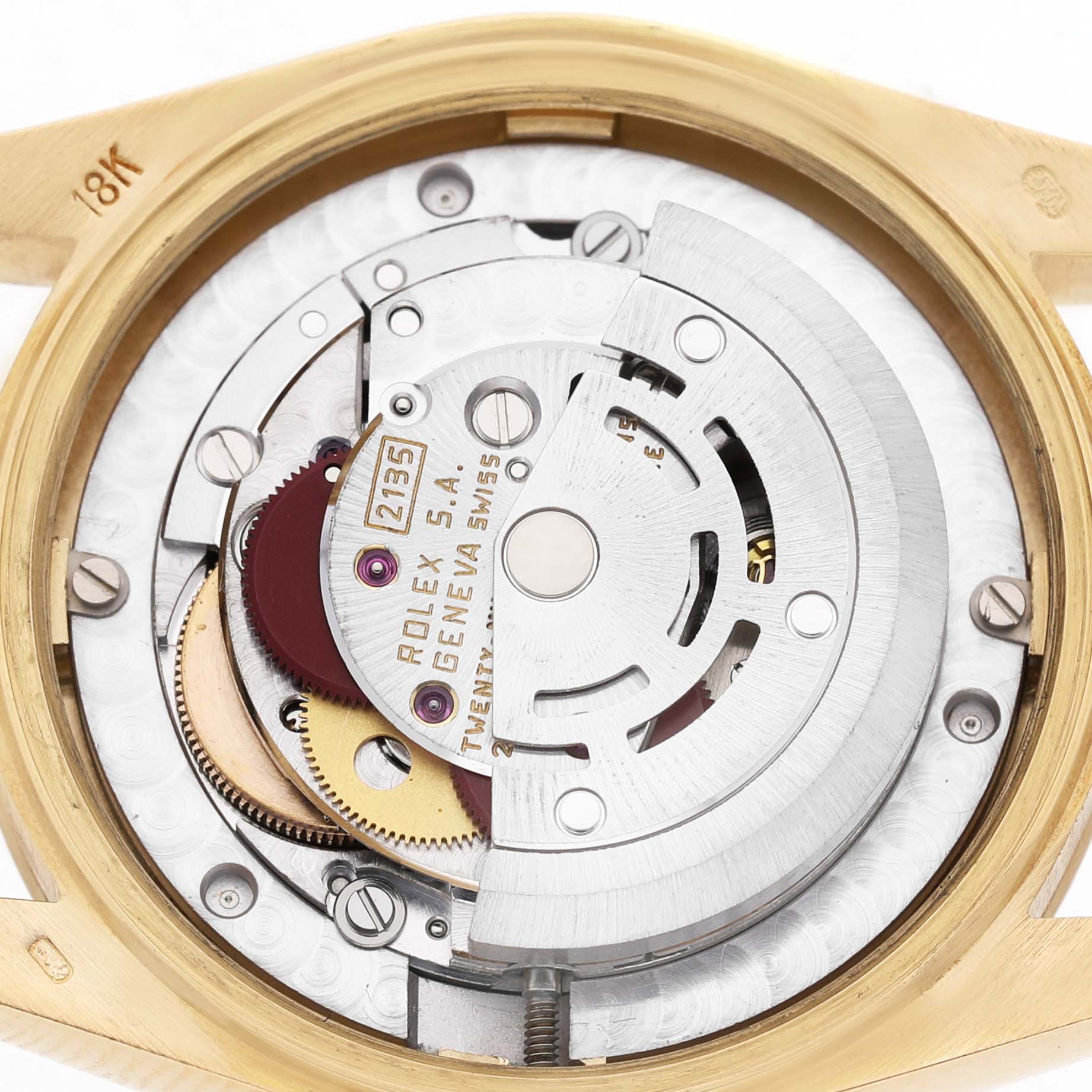 The image shows the inner mechanics and movement of a Rolex President 68278 Women's Yellow Gold Blue Dial model watch from the back.