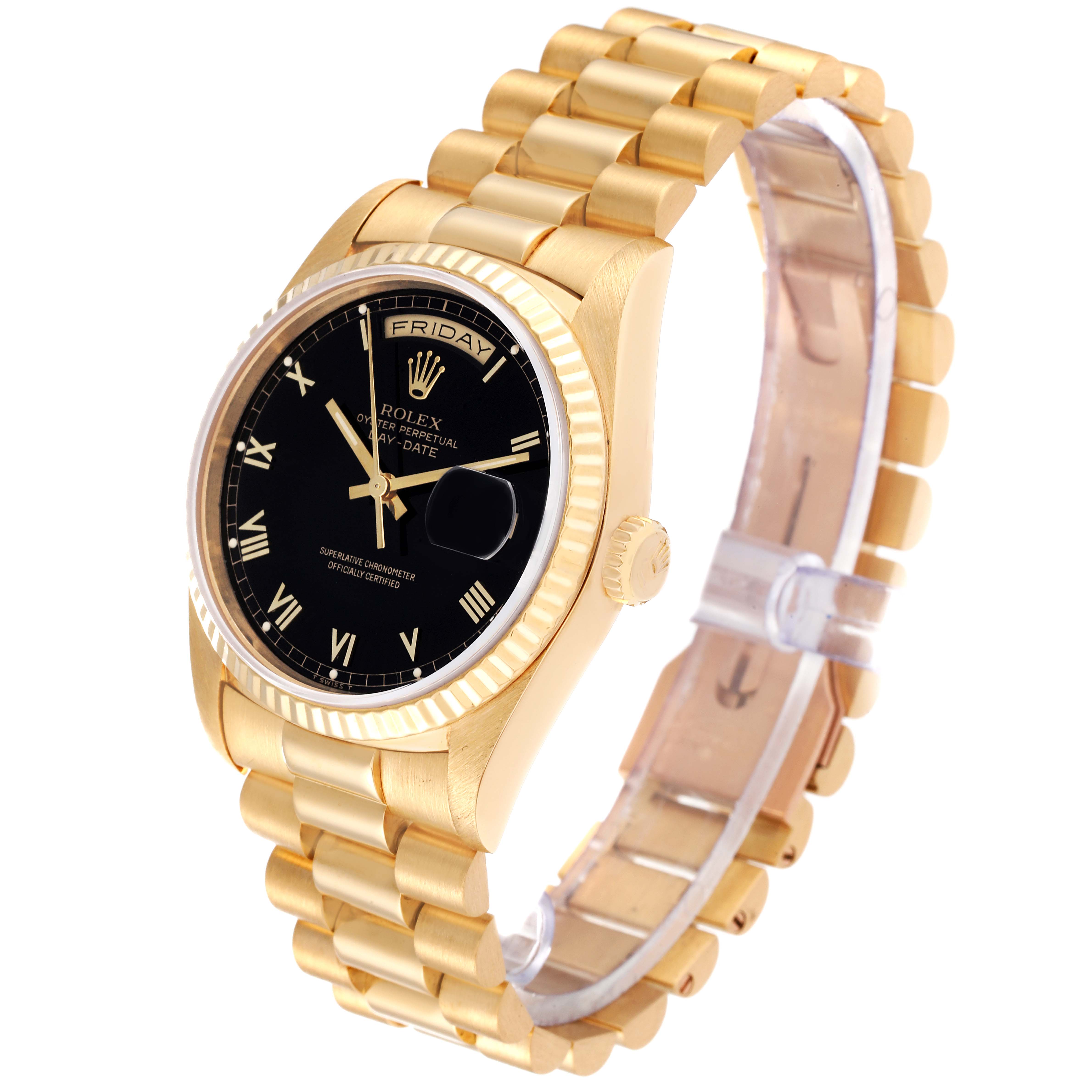 This photo shows a Rolex President 18238 Men's Yellow Gold Black Dial 18238 Men's Yellow Gold Black Dial model watch from a three-quarter angle, displaying its black dial, gold case, and bracelet.