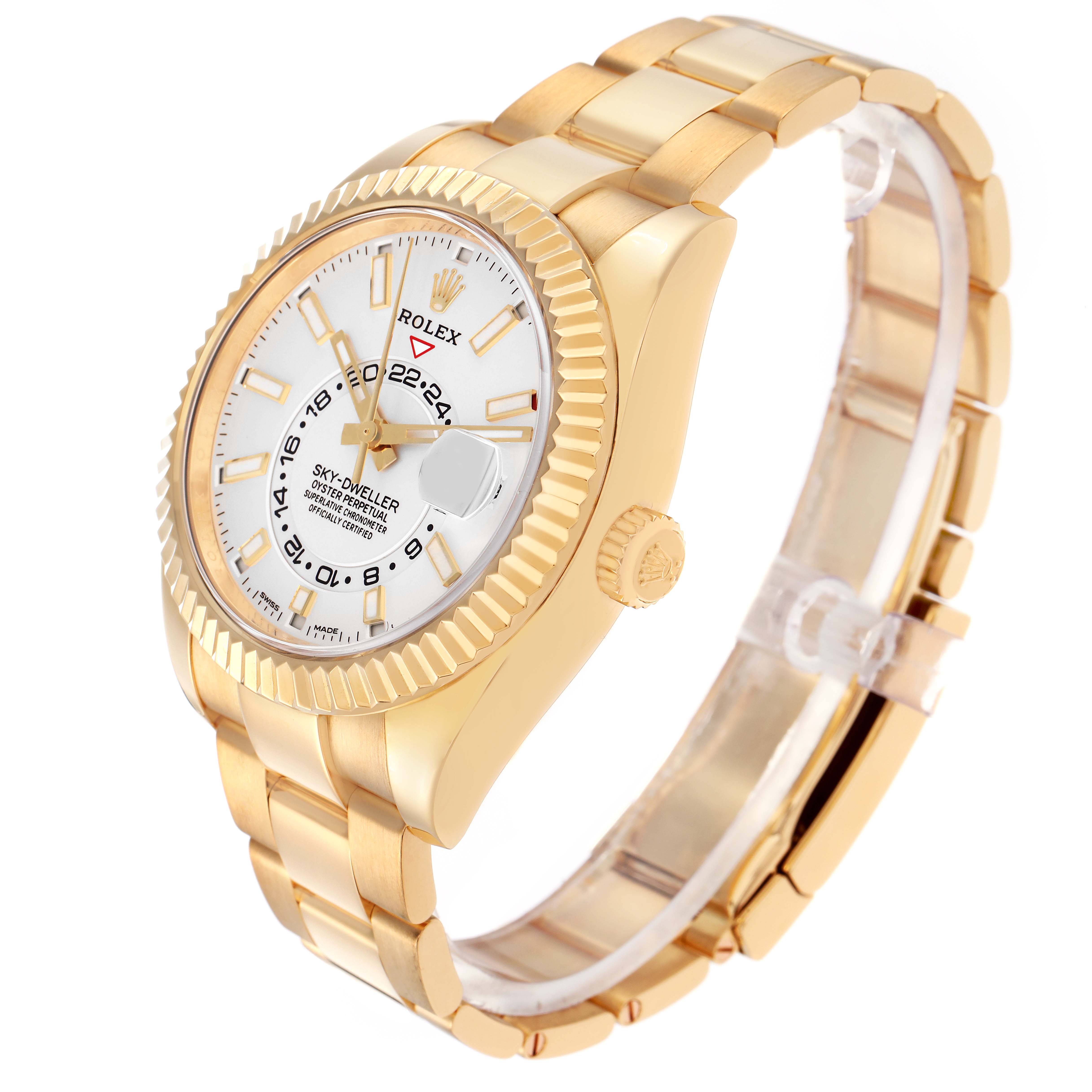 The Rolex Sky-Dweller 326938 Men
s Yellow Gold White Dial 326938 Men
s Yellow Gold White Dial is shown at a three-quarter angle, highlighting the gold case, fluted bezel, dial, and bracelet.