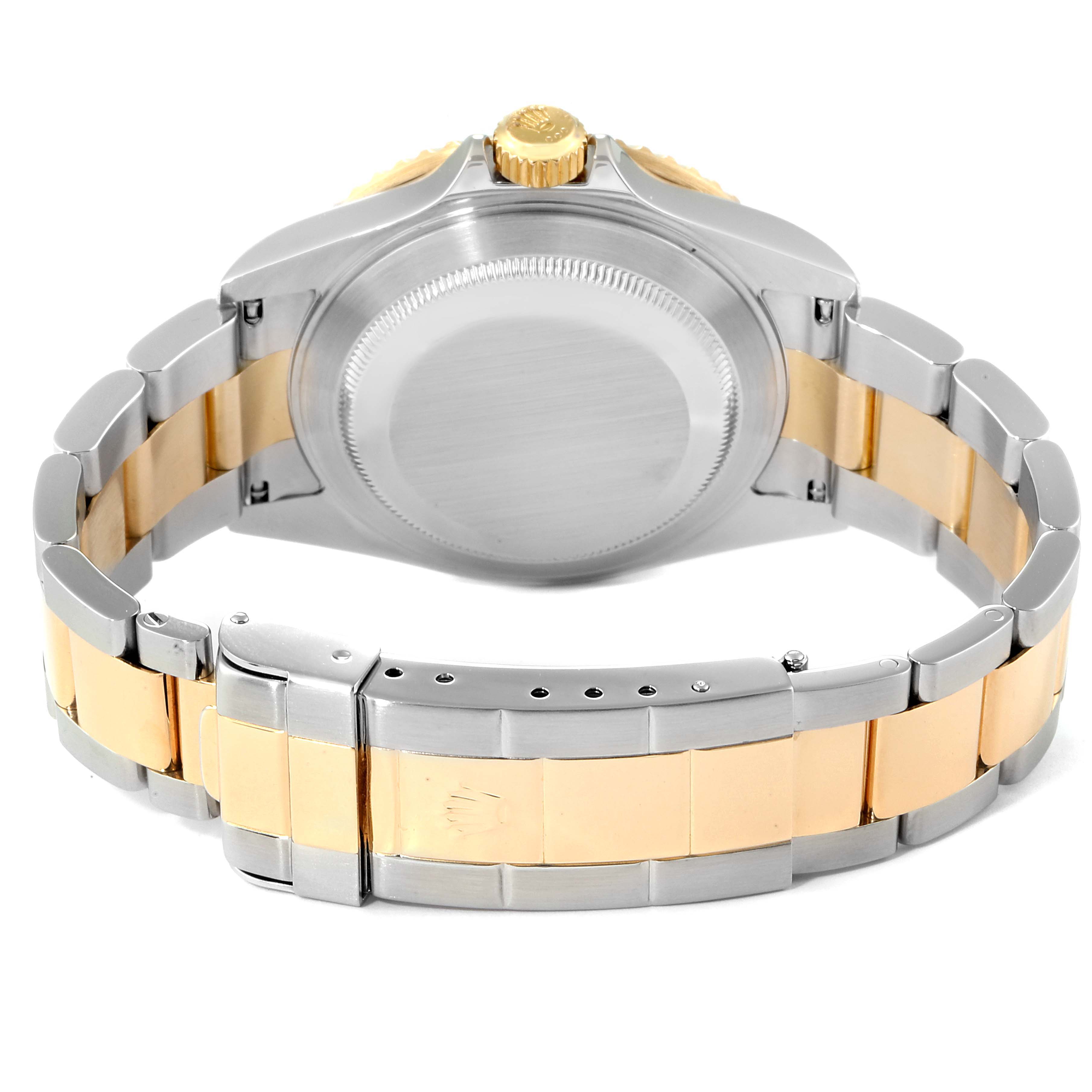 This image shows the back view of the Rolex Submariner 16613 Men
s Steel and Gold (two tone) Blue Dial 16613 Men
s Steel and Gold (two tone) Blue Dial watch, highlighting its case back and two-tone bracelet.