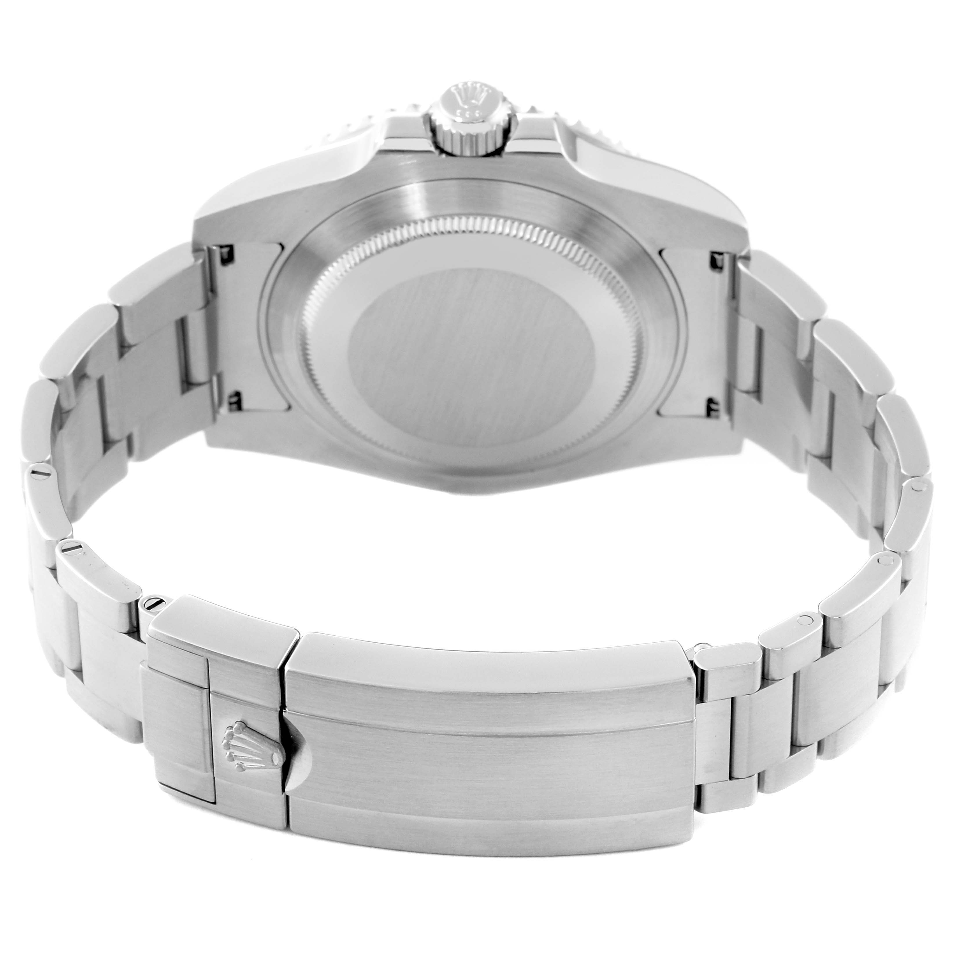 The image shows the back of a Rolex Submariner 116610 Men
s Stainless Steel Black Dial 116610 Men
s Stainless Steel Black Dial watch, including the case back, crown, and metal bracelet with a clasp.