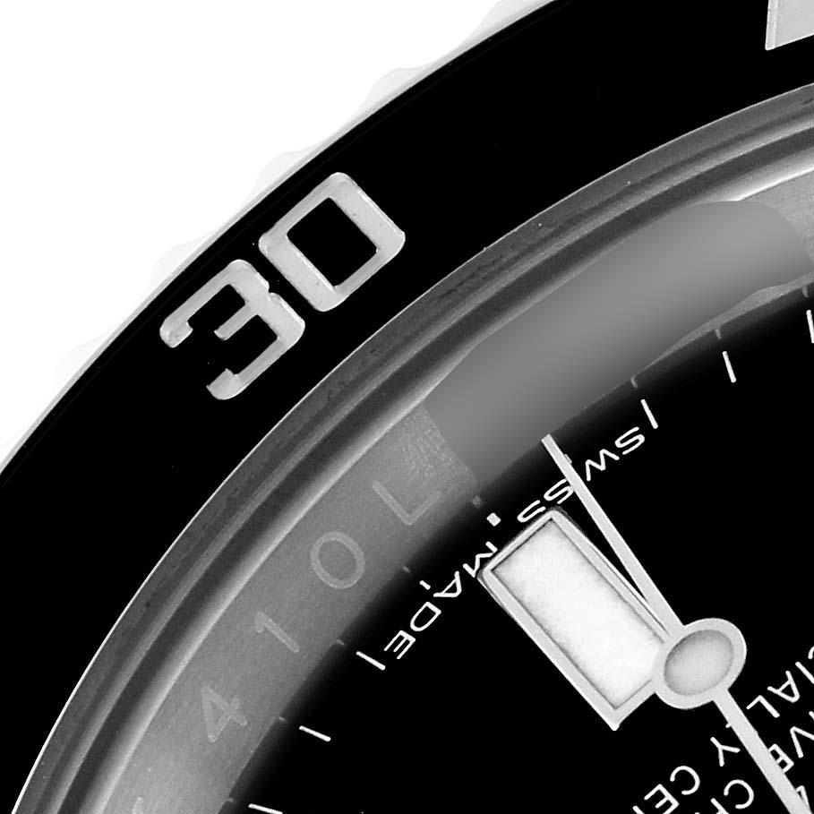 This image shows a close-up view of the bezel and part of the dial of a Rolex Submariner 116610 Men
s Stainless Steel Black Dial 116610 Men
s Stainless Steel Black Dial watch.