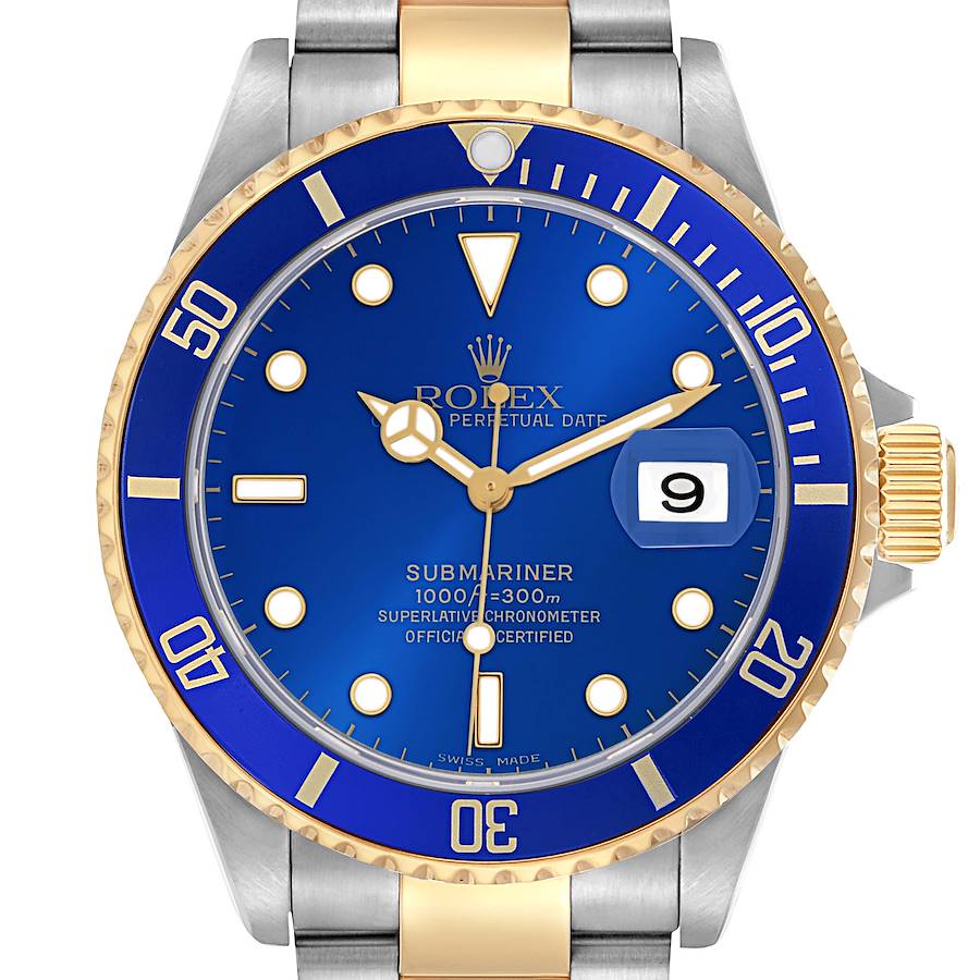 The Rolex Submariner watch is shown from a front angle, highlighting the blue dial, bezel, and two-tone band.