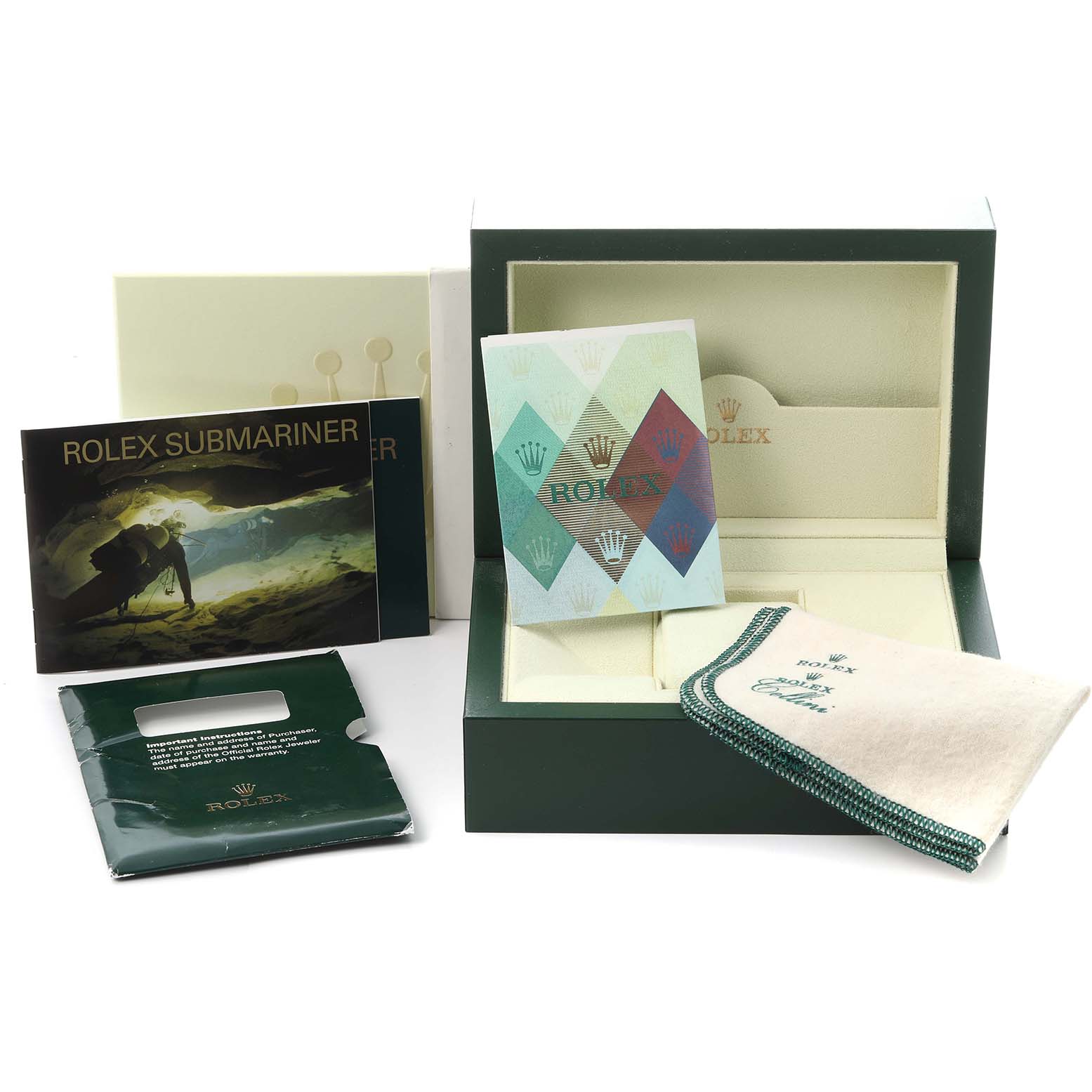 The image shows a Rolex Submariner 16613 Men
s Steel and Gold (two tone) Blue Dial 16613 Men
s Steel and Gold (two tone) Blue Dial box, cloth, and warranty cards at an angle displaying the box interior and accessories.