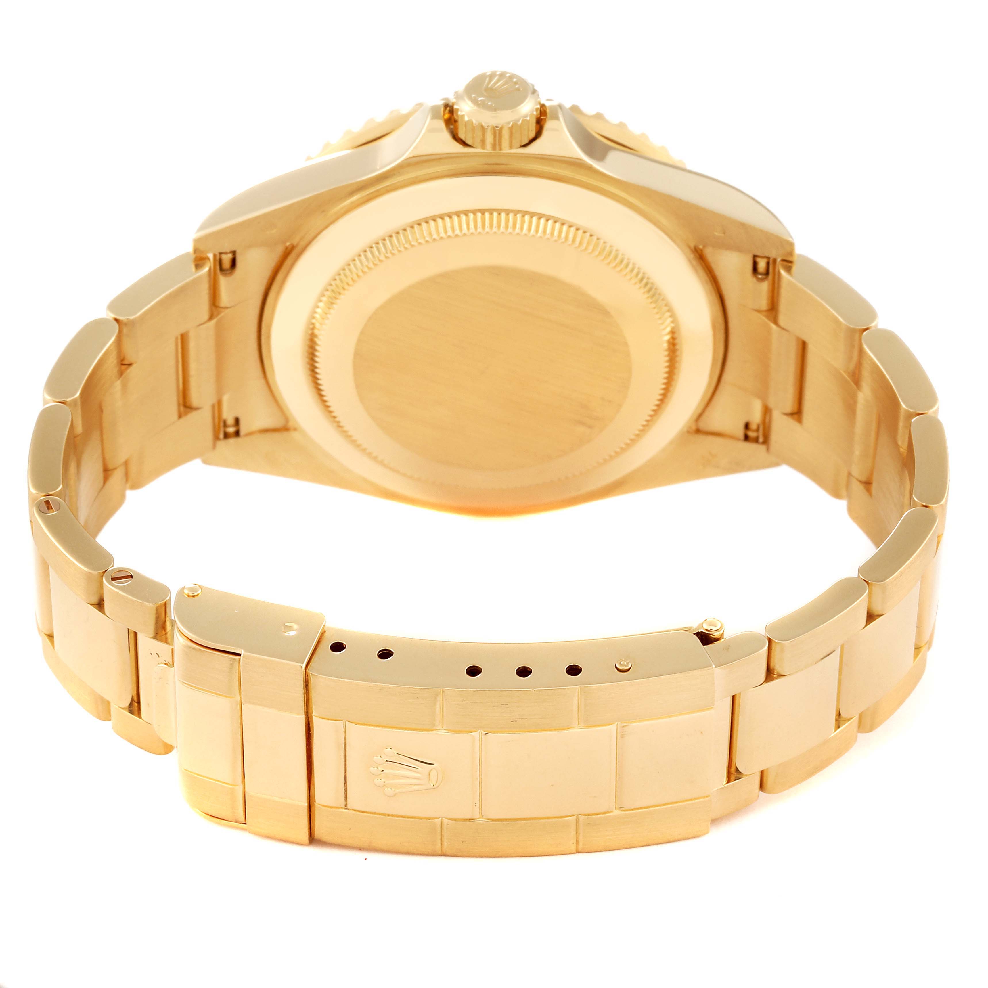 The image shows the back and bracelet of a Rolex Submariner 16618 Men's Yellow Gold Black Dial 16618 Men's Yellow Gold Black Dial watch, focused on the case back and clasp.