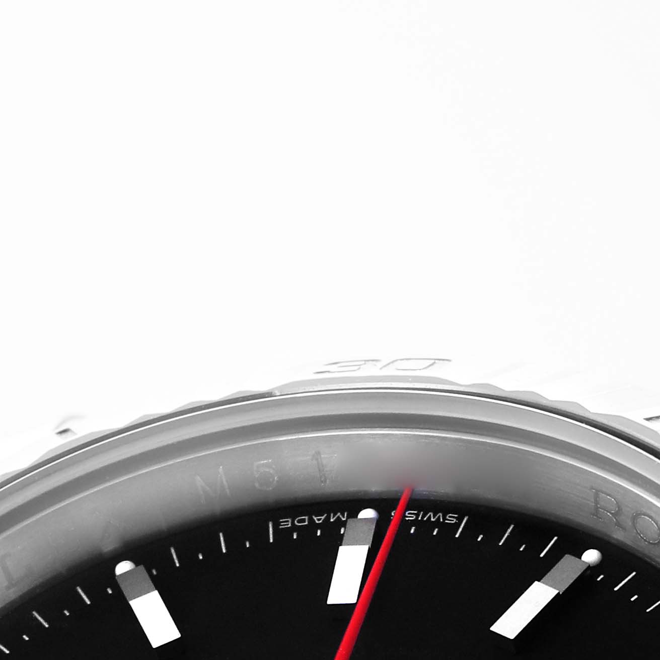 The image shows a close-up of the bezel and part of the dial of a Rolex Turn-o-Graph 116264 Men
s Stainless Steel Black Dial 116264 Men
s Stainless Steel Black Dial watch, viewed at an angle.