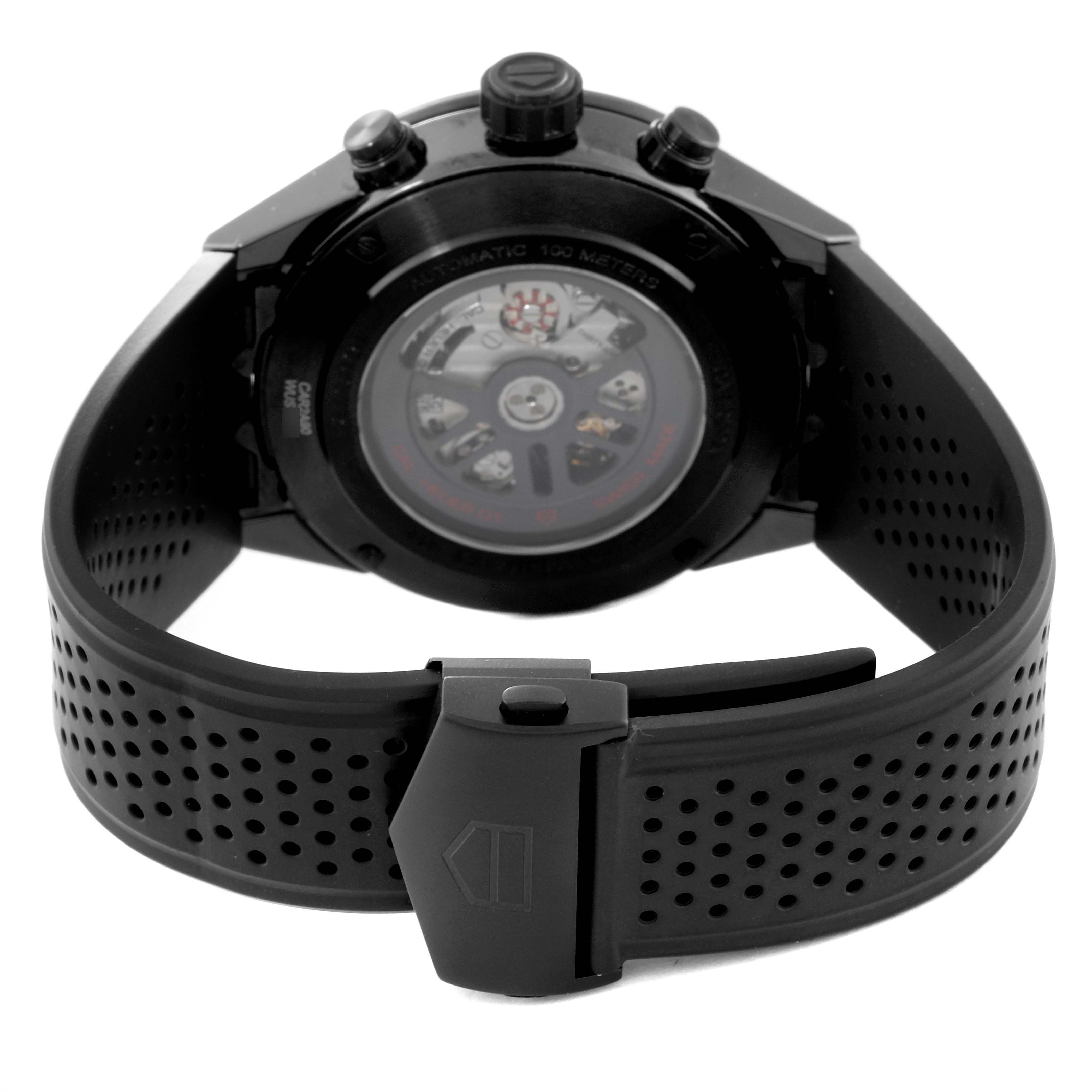 This image shows the back view of the Tag Heuer Carrera CAR2A90.FT6071 Men's Ceramic Black Dial CAR2A90.FT6071 Men's Ceramic Black Dial watch, displaying its strap, clasp, and transparent case back.