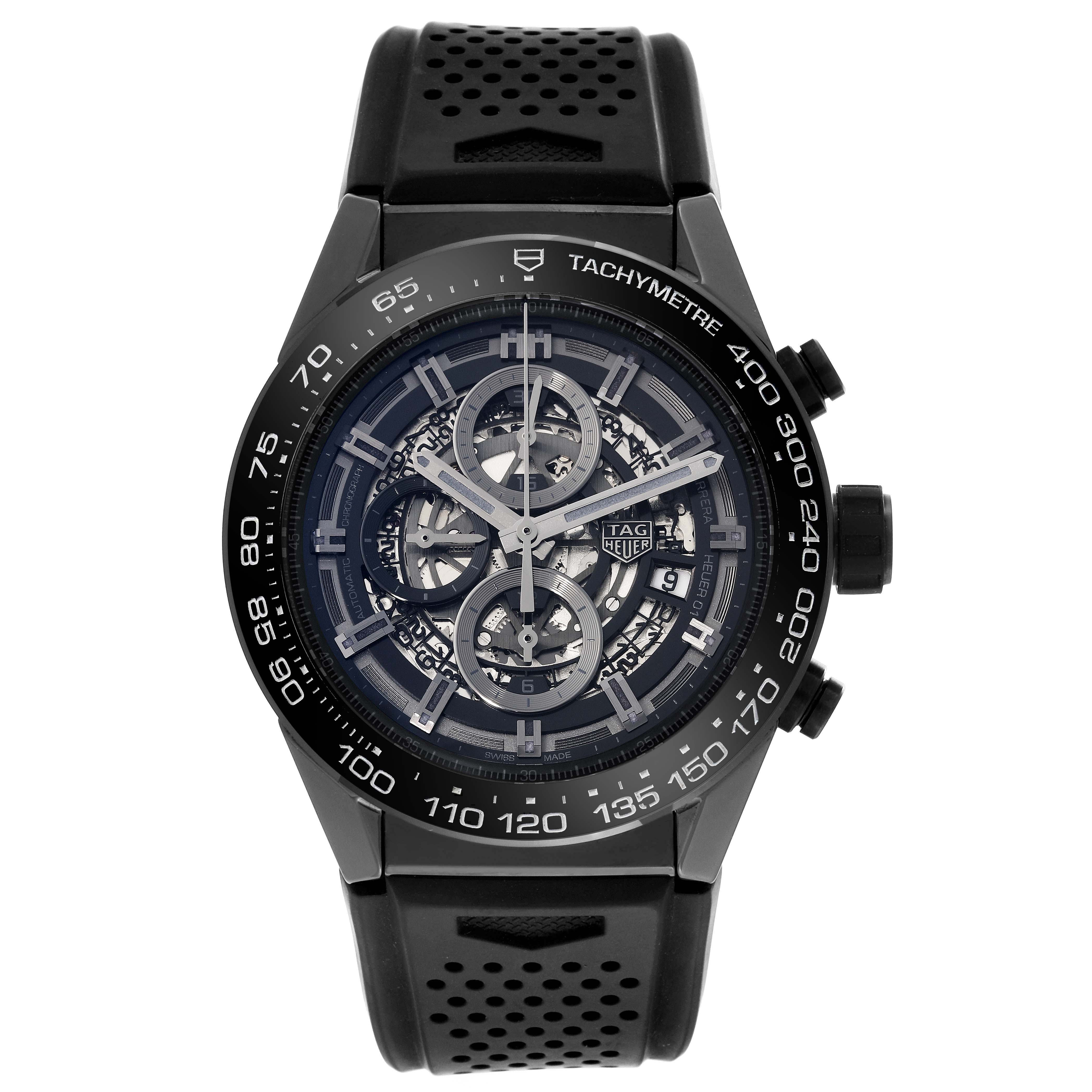 The image shows a front view of a Tag Heuer Carrera CAR2A90.FT6071 Men's Ceramic Black Dial CAR2A90.FT6071 Men's Ceramic Black Dial model watch with a black perforated rubber strap.