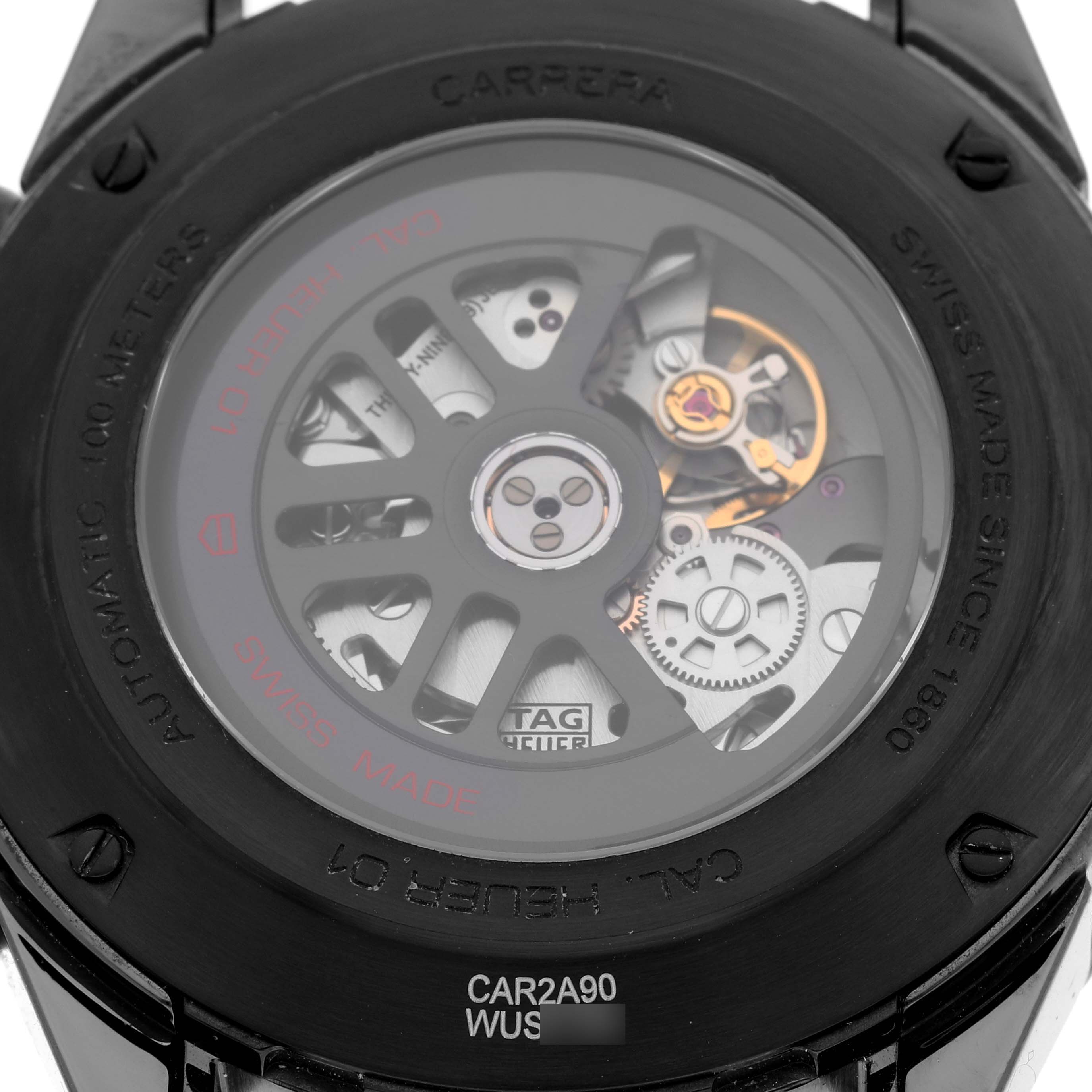 The image shows the back view of the Tag Heuer Carrera CAR2A90.FT6071 Men's Ceramic Black Dial CAR2A90.FT6071 Men's Ceramic Black Dial watch, revealing its inner mechanical components.