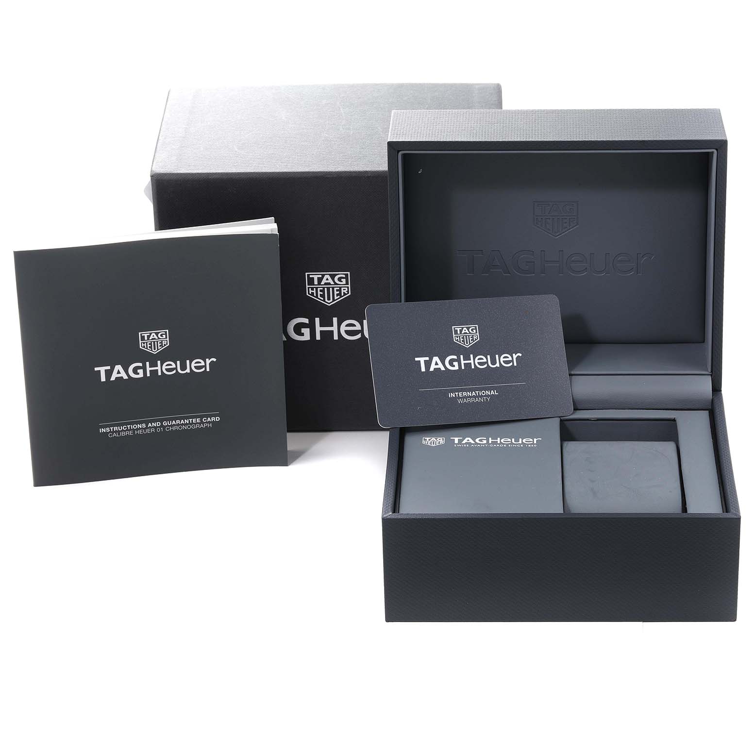 The image shows the packaging, warranty card, instruction booklet, and box for a Tag Heuer Carrera CAR2A90.FT6071 Men's Stainless Steel Black Dial CAR2A90.FT6071 Men's Stainless Steel Black Dial watch.