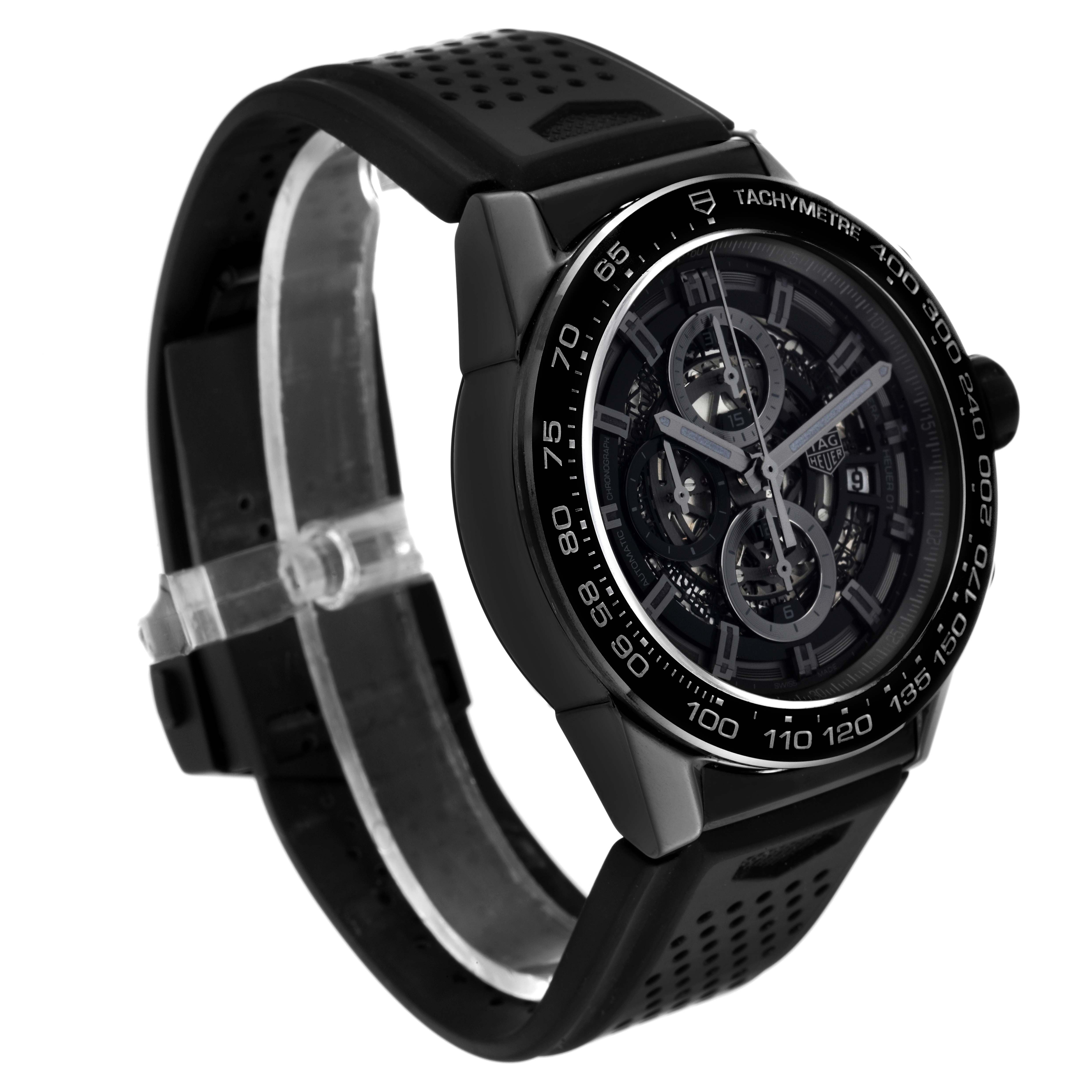 The image shows a Tag Heuer Carrera CAR2A90.FT6071 Men's Stainless Steel Black Dial CAR2A90.FT6071 Men's Stainless Steel Black Dial model watch at a three-quarter angle, highlighting its black strap and detailed face.