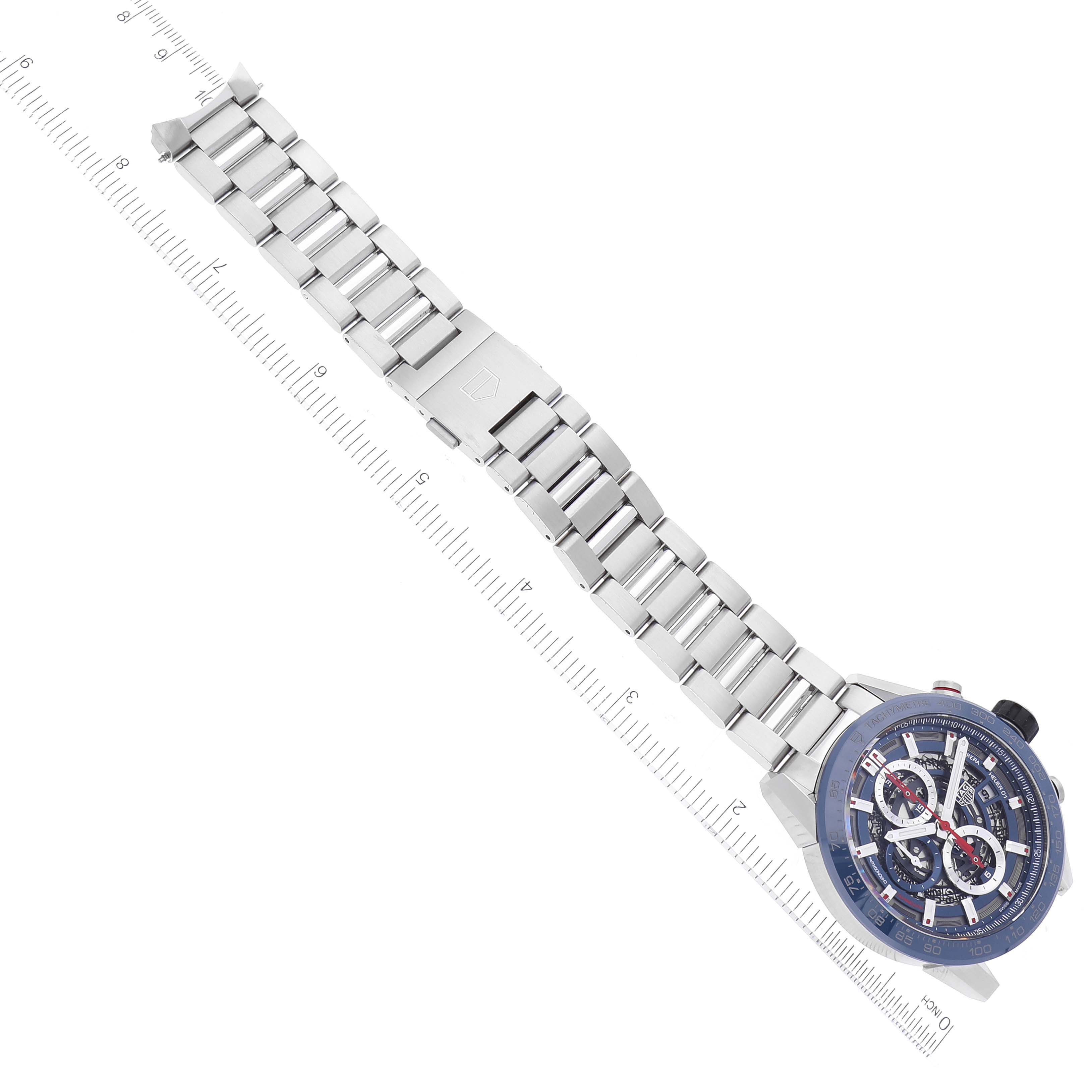 This Tag Heuer Carrera CAR201T Men's Stainless Steel Transparent Dial CAR201T Men's Stainless Steel Transparent Dial watch is shown at an angle, focusing on its face and metal bracelet.