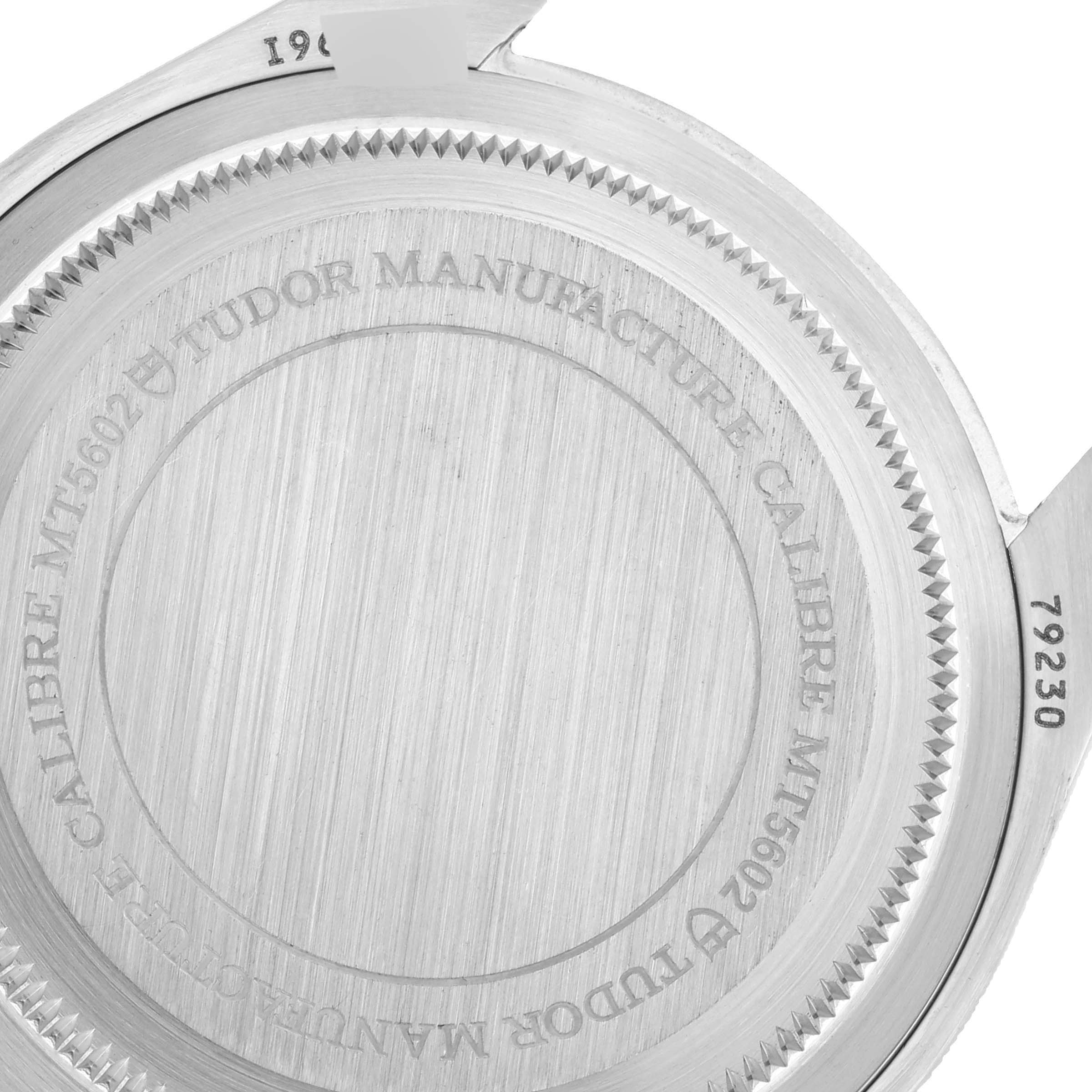 The image shows the case back of the Tudor Heritage Black Bay 79230R Men
s Stainless Steel Black Dial 79230R Men
s Stainless Steel Black Dial watch, displaying the model and calibre information.