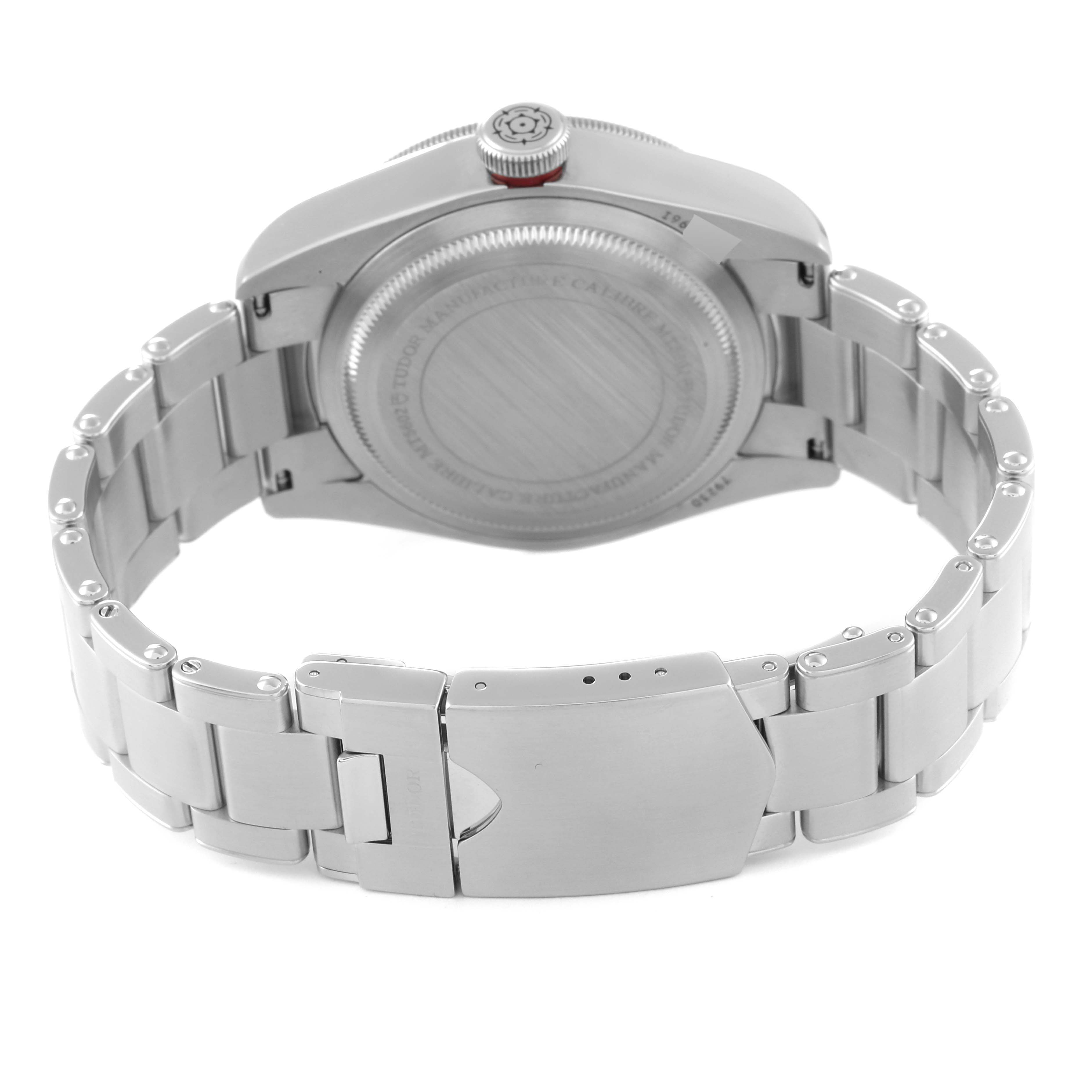 The image shows the back casing and clasp of the Tudor Heritage Black Bay 79230R Men
s Stainless Steel Black Dial 79230R Men
s Stainless Steel Black Dial watch from a rear angle.