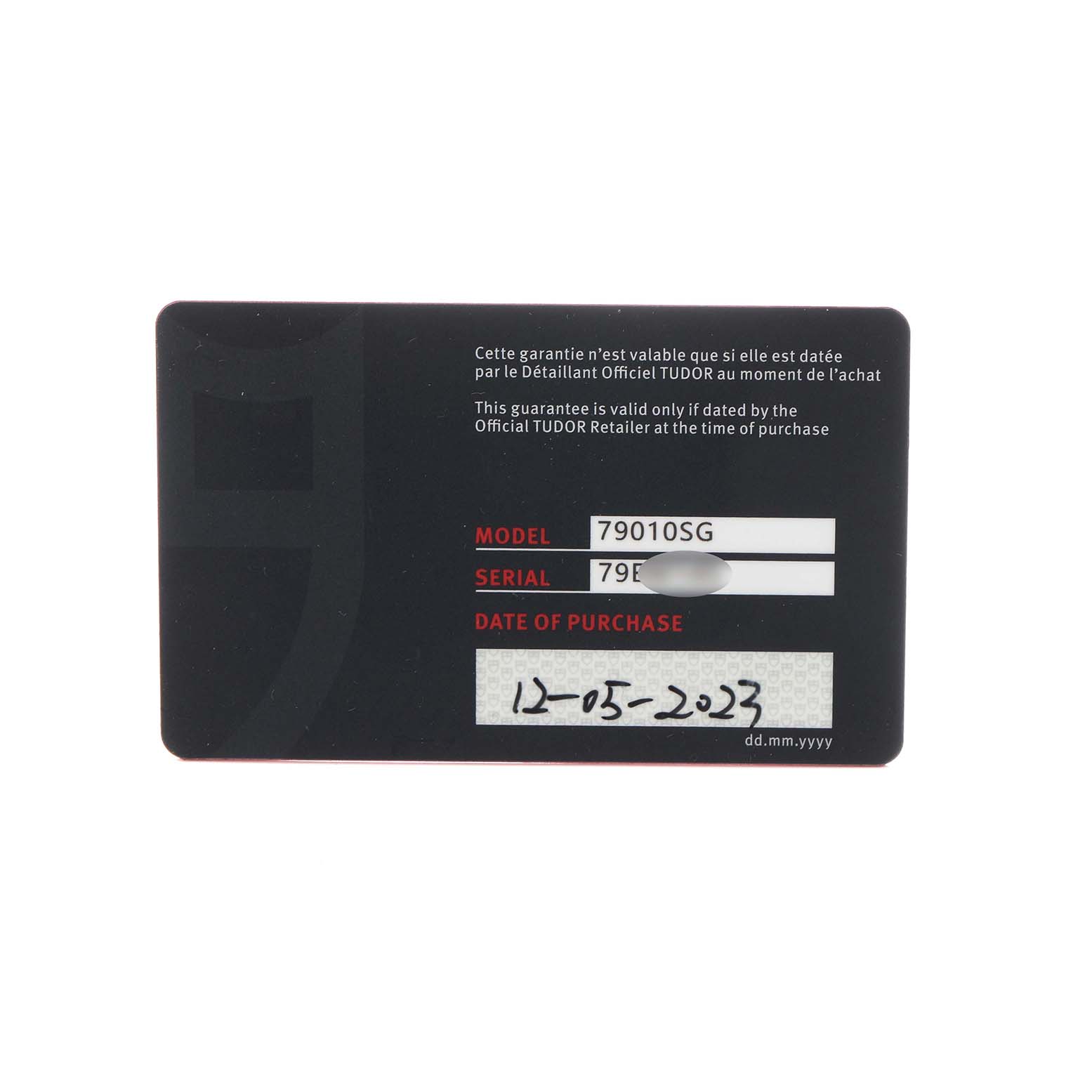 The image shows a warranty card for a Tudor Heritage Black Bay 79010 Men
s Stainless Steel Grey Dial 79010 Men
s Stainless Steel Grey Dial watch, displaying the model number, serial number, and purchase date.