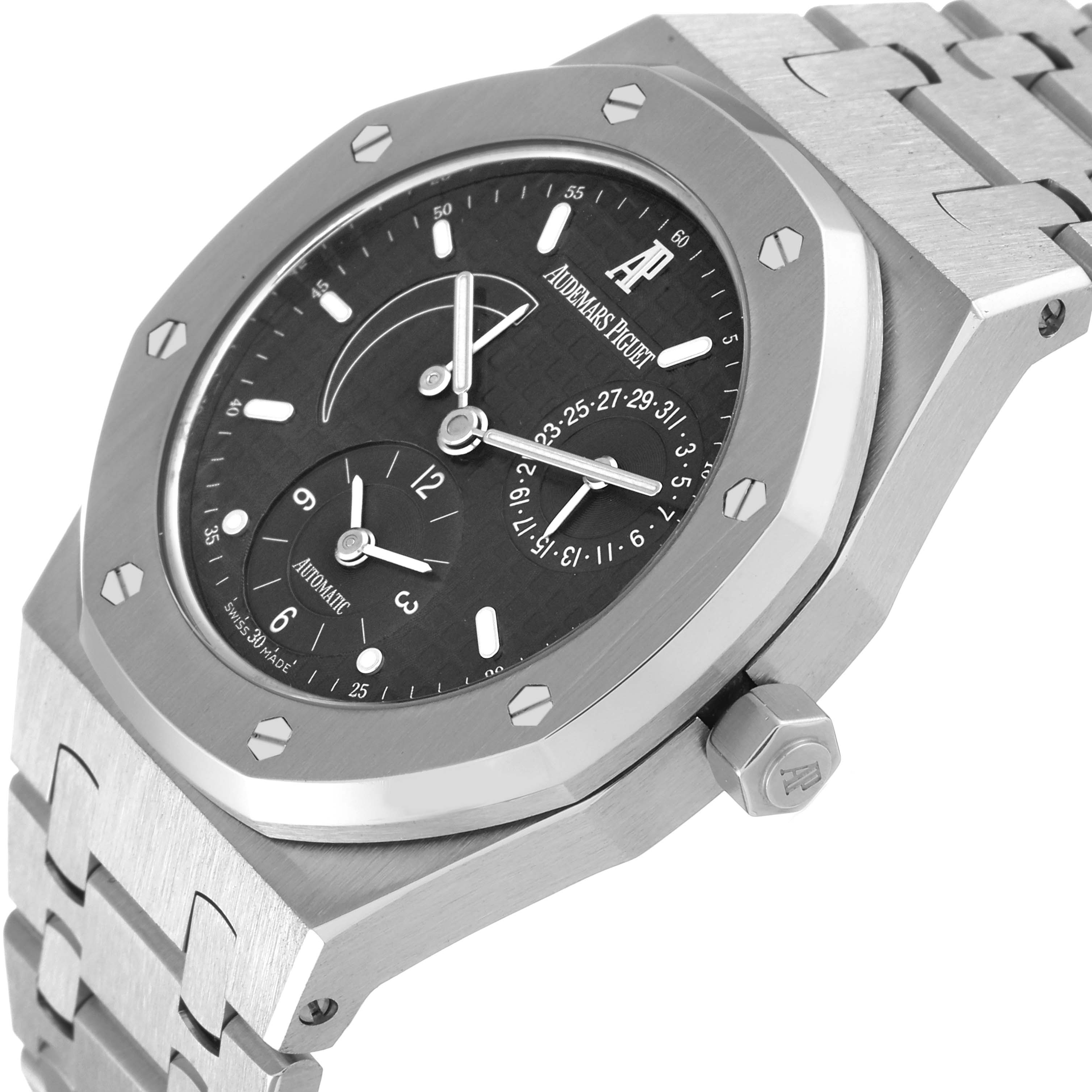 The image shows a close-up angle of the Audemars Piguet Royal Oak 25730ST Men's Stainless Steel Black Dial 25730ST Men's Stainless Steel Black Dial watch emphasizing its face, bezel, and bracelet.