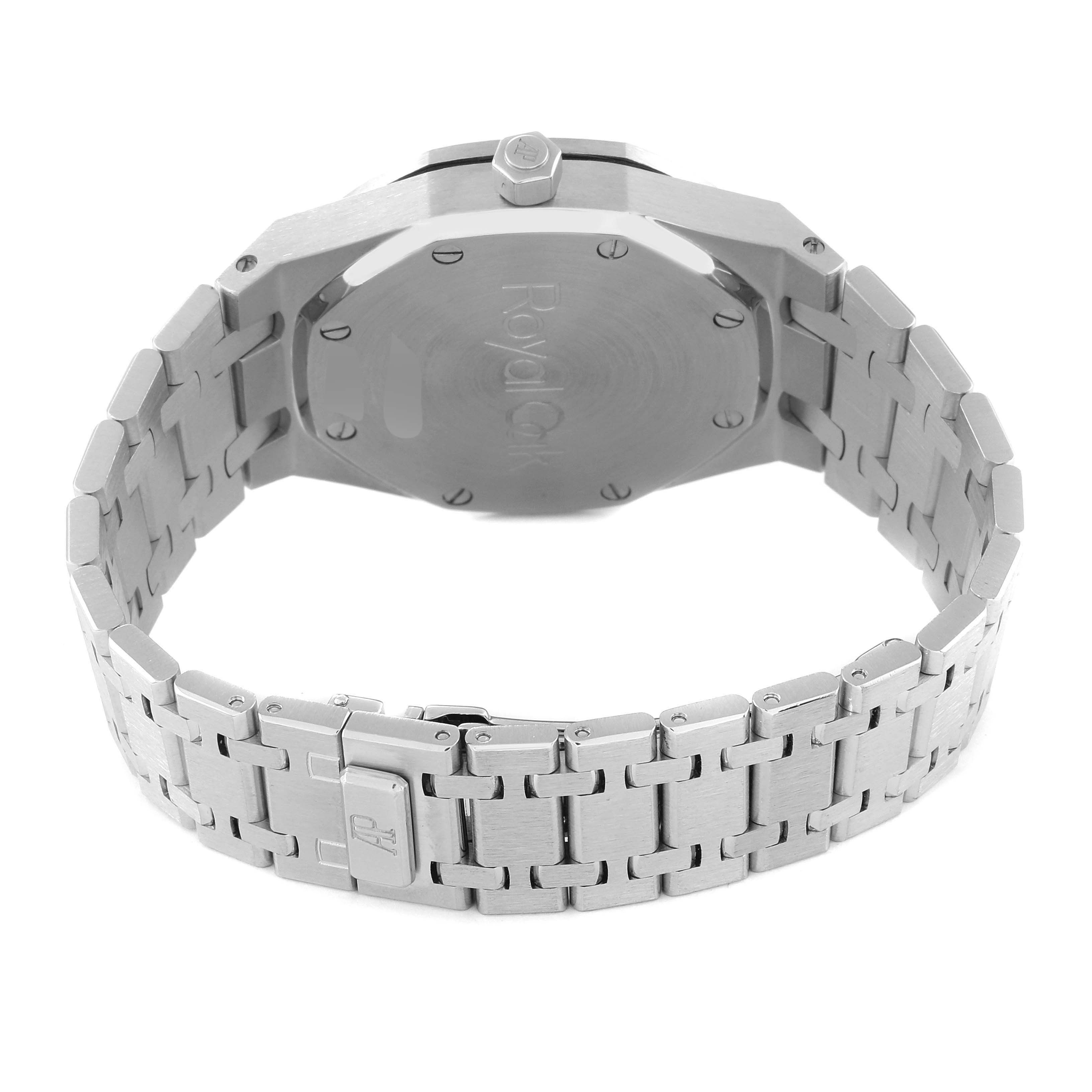 The image shows the back view of a Royal Oak watch by Audemars Piguet, highlighting its case back and bracelet.