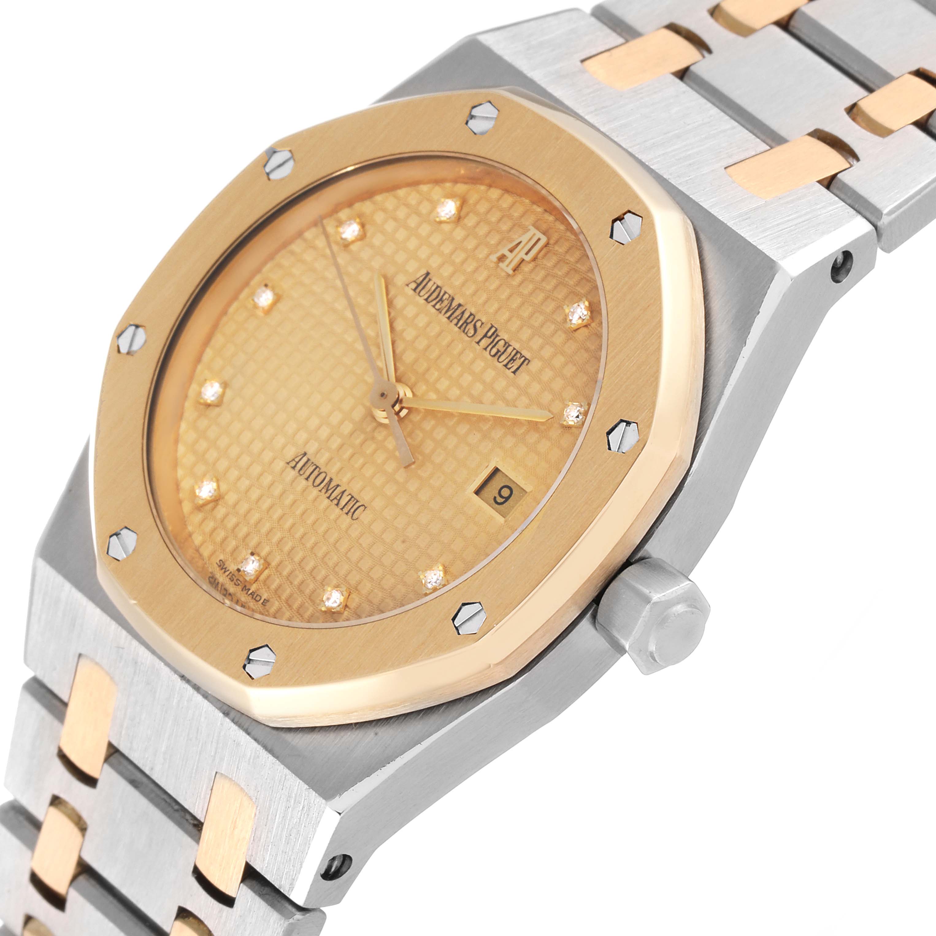 The image shows a close-up, angled view of an Audemars Piguet Royal Oak 15000SA-O-0789SA Men's Steel and Gold (two tone) Champagne Dial 15000SA-O-0789SA Men's Steel and Gold (two tone) Champagne Dial watch, highlighting its dial, bezel, and part of the bracelet.