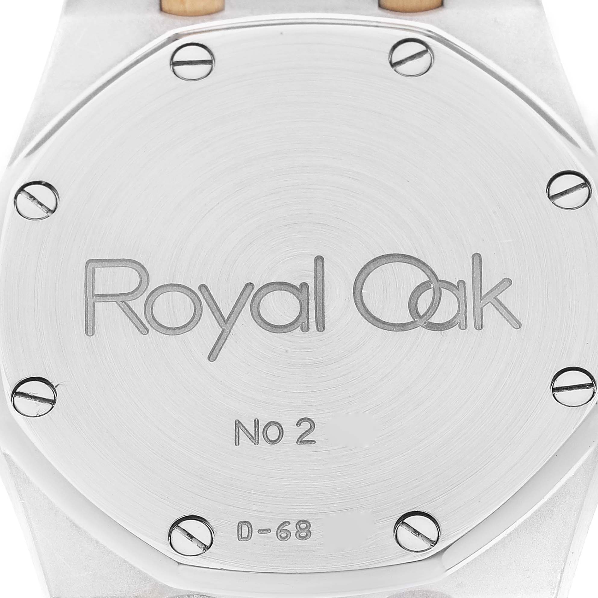 The image shows the back case of a Royal Oak model watch by Audemars Piguet, featuring the model name and serial number.