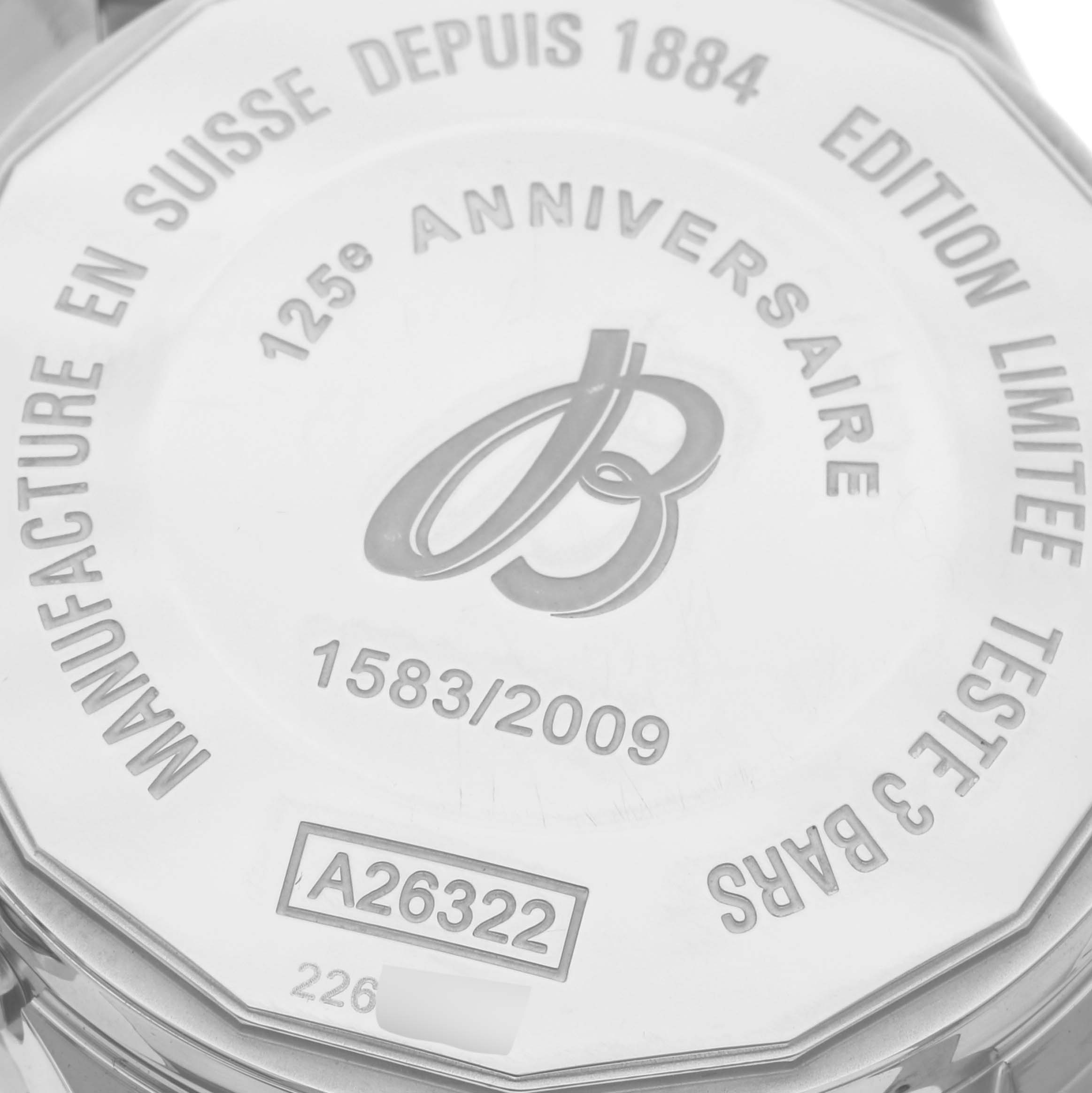 The image shows the back case of a Breitling Limited Series watch model A26322, highlighting its anniversary engraving.